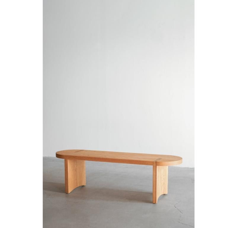 This bench is custom made in Los Angeles. The solid wood top is joined and cut to size. The solid wood base is fitted and joined to the top.

Oak
Hardwax Oil Finish

For all furniture, protection from heat and moisture is crucial to the longevity of
