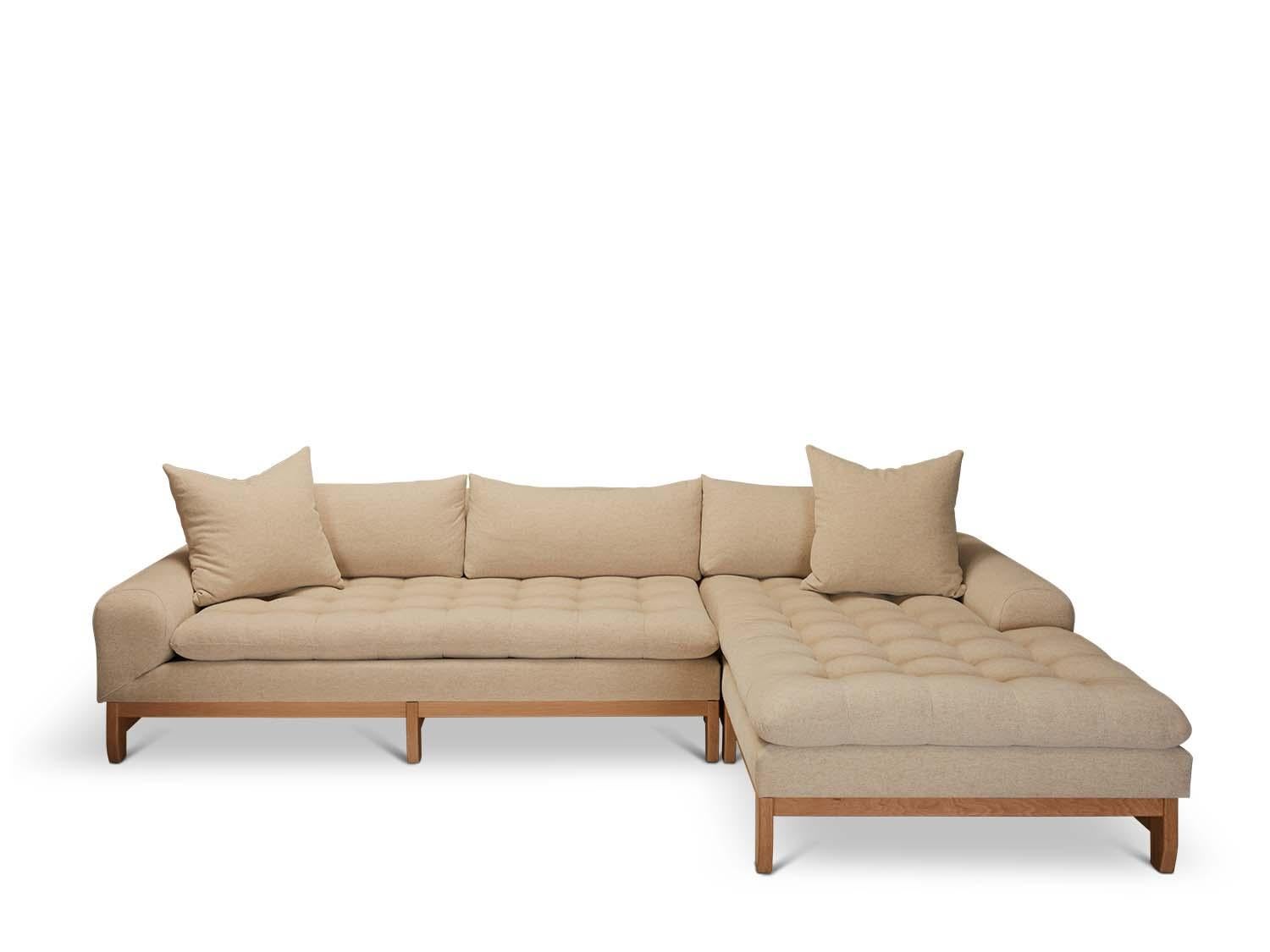 The Morro Sectional is our deepest and largest scaled sectional featuring a biscuit tufted seat, loose back cushions and a geometrically sculpted base. Available in American walnut or white oak.

The Lawson-Fenning Collection is designed and