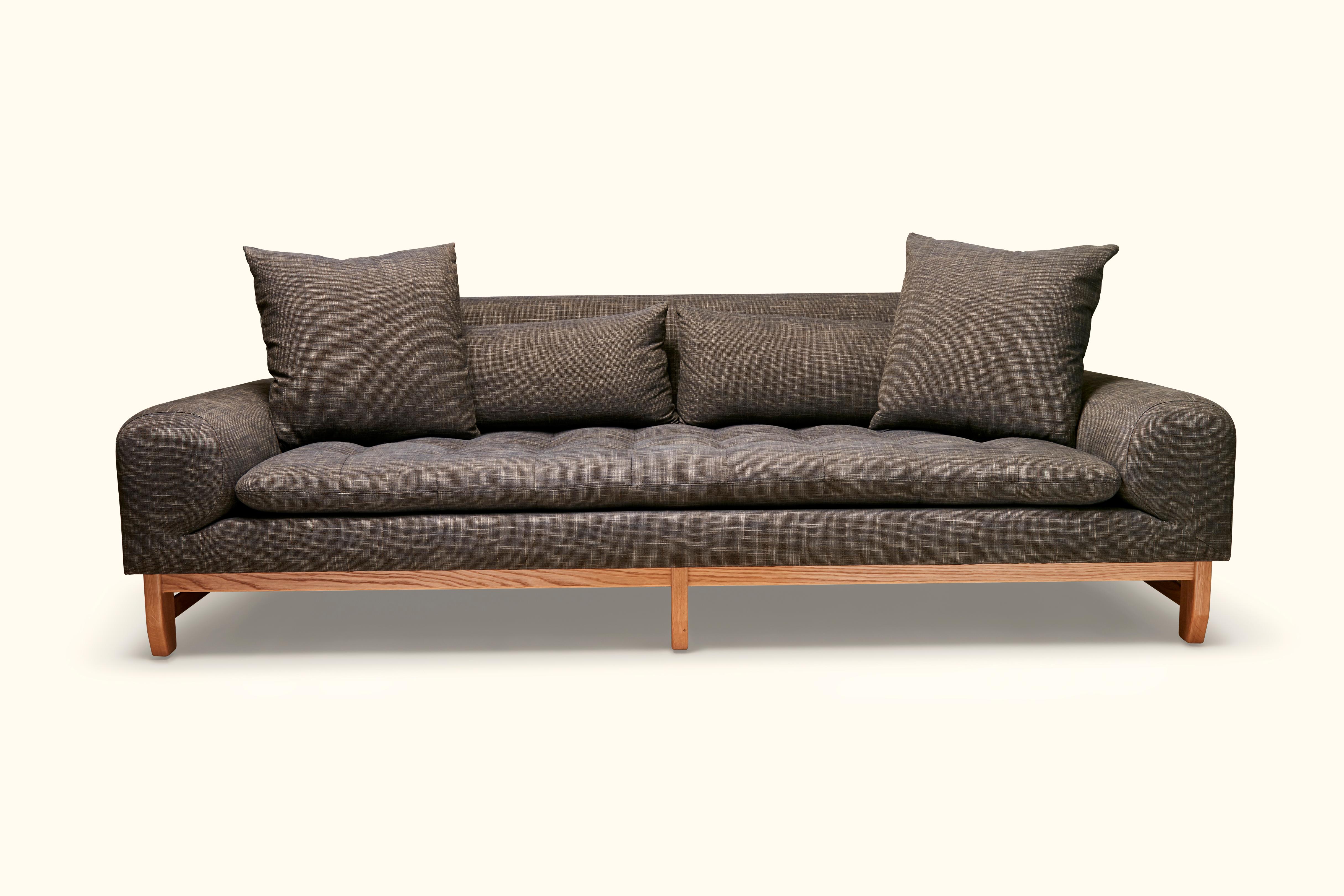 The Morro sofa is our deepest and largest scaled sofa featuring a biscuit tufted seat, loose back cushions and a geometrically sculpted base. Available in American walnut or white oak.

To Order: $3,650 + COM
As Shown: $4,995.