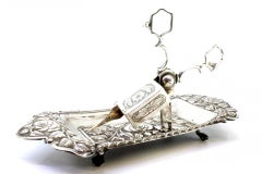 Morrões tray & scissors w/ raised floral motifs & 4 claw feet