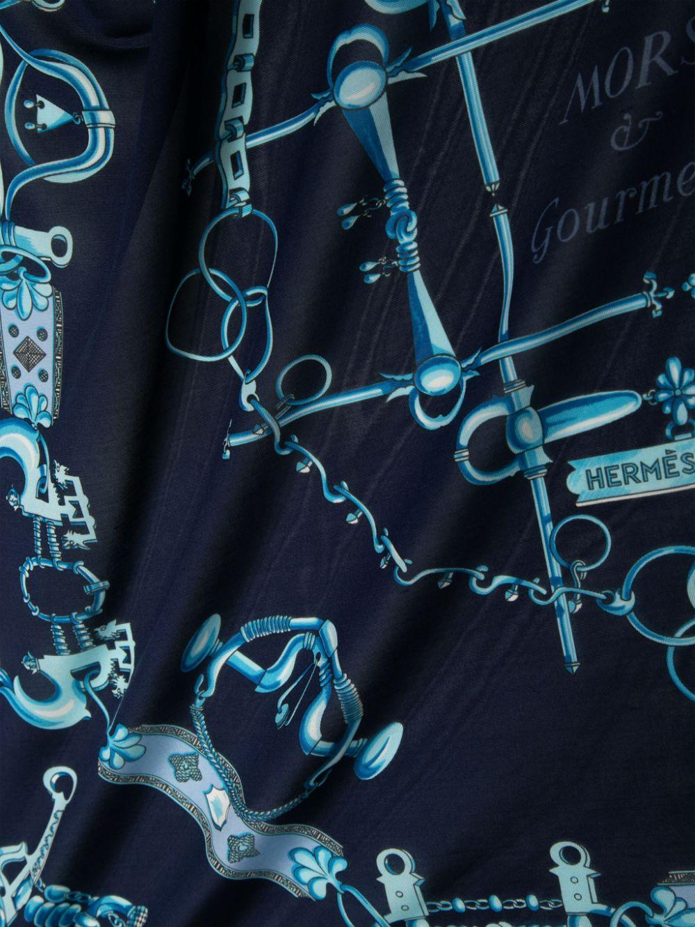 This luxurious Silk Jersey Scarf in navy by Hermes is the perfect accessory for any outfit. Made from high-quality silk, it offers both style and comfort. The smooth texture and vibrant colour add a touch of elegance to your look. Elevate your