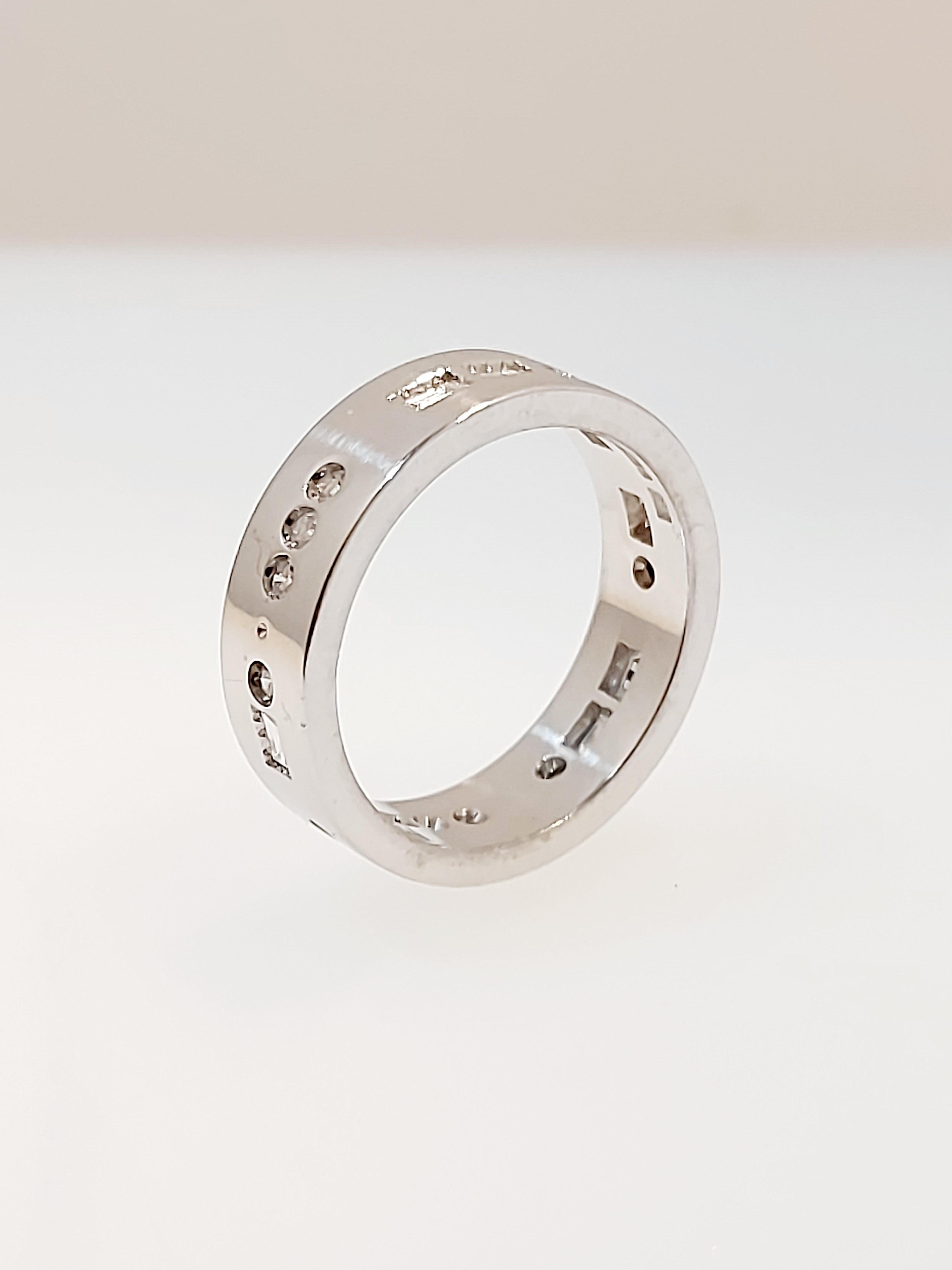 Diamond set Morse code ring spelling “Always” with baguette and brilliant cut diamonds total weight  .56ct,  colour G, clarity VS1. Designed and made by Eric N Smith of Glasgow 6.2mm wide depth 1.9mm size 58.
