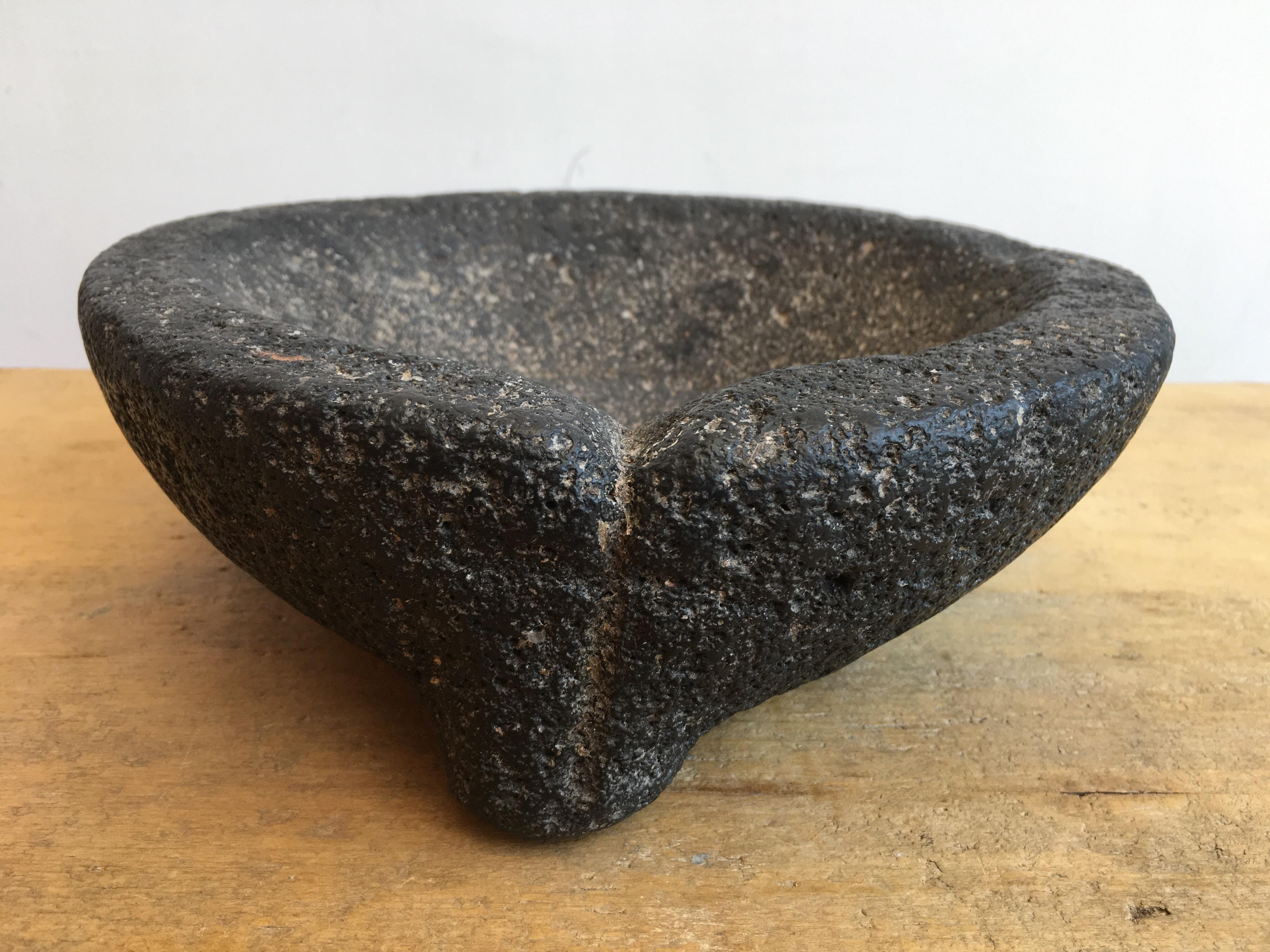 Volcanic stone mortar and pestle from the Puebla highlands, circa 1970s.
