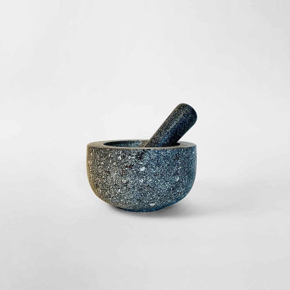Solid mortar and pestle made in solid grey granite.