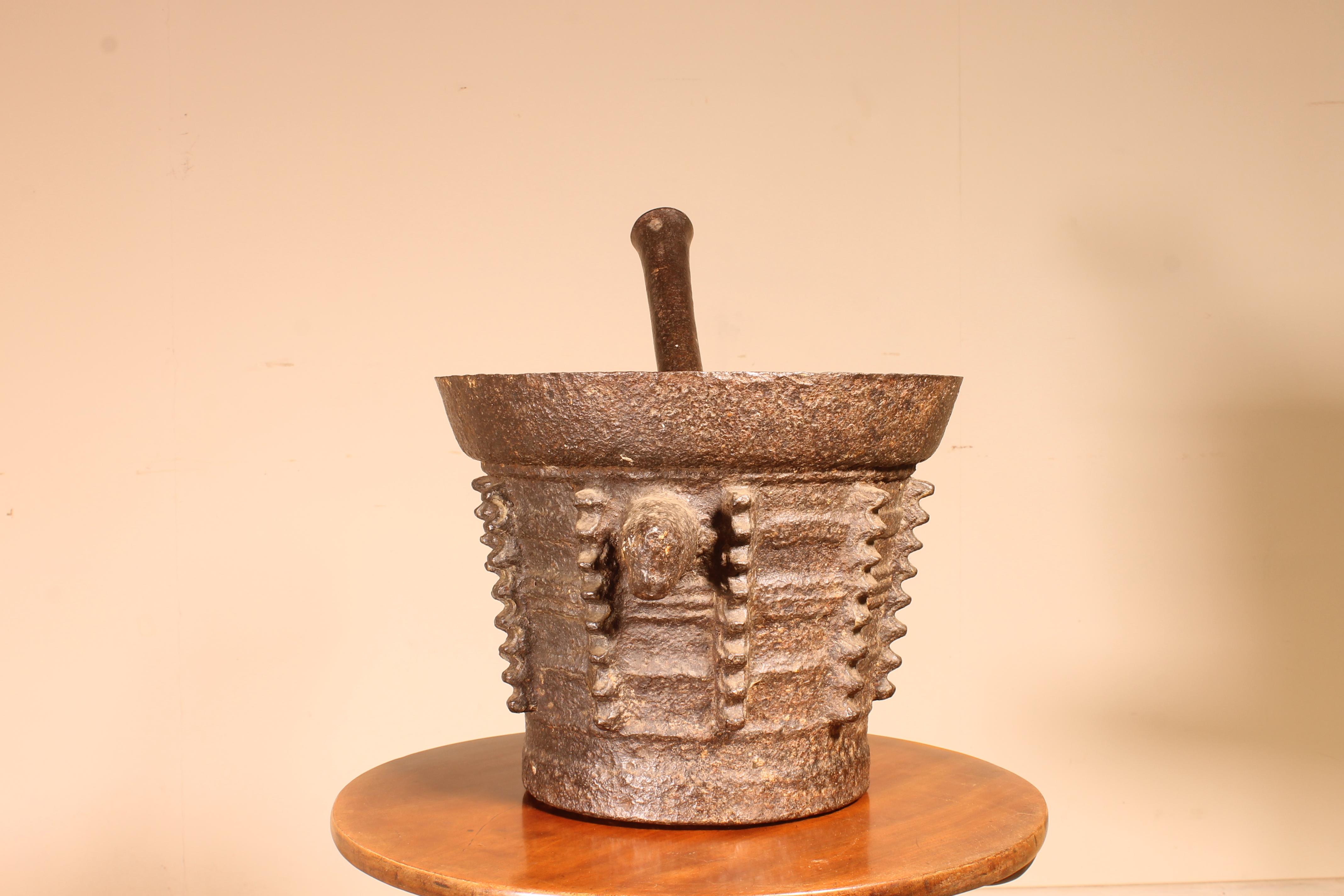 Iron mortar with its original pestle end 15th beginning 16th century Gothic period, France

Beautiful original object with a beautiful patina and in good condition 
 
  