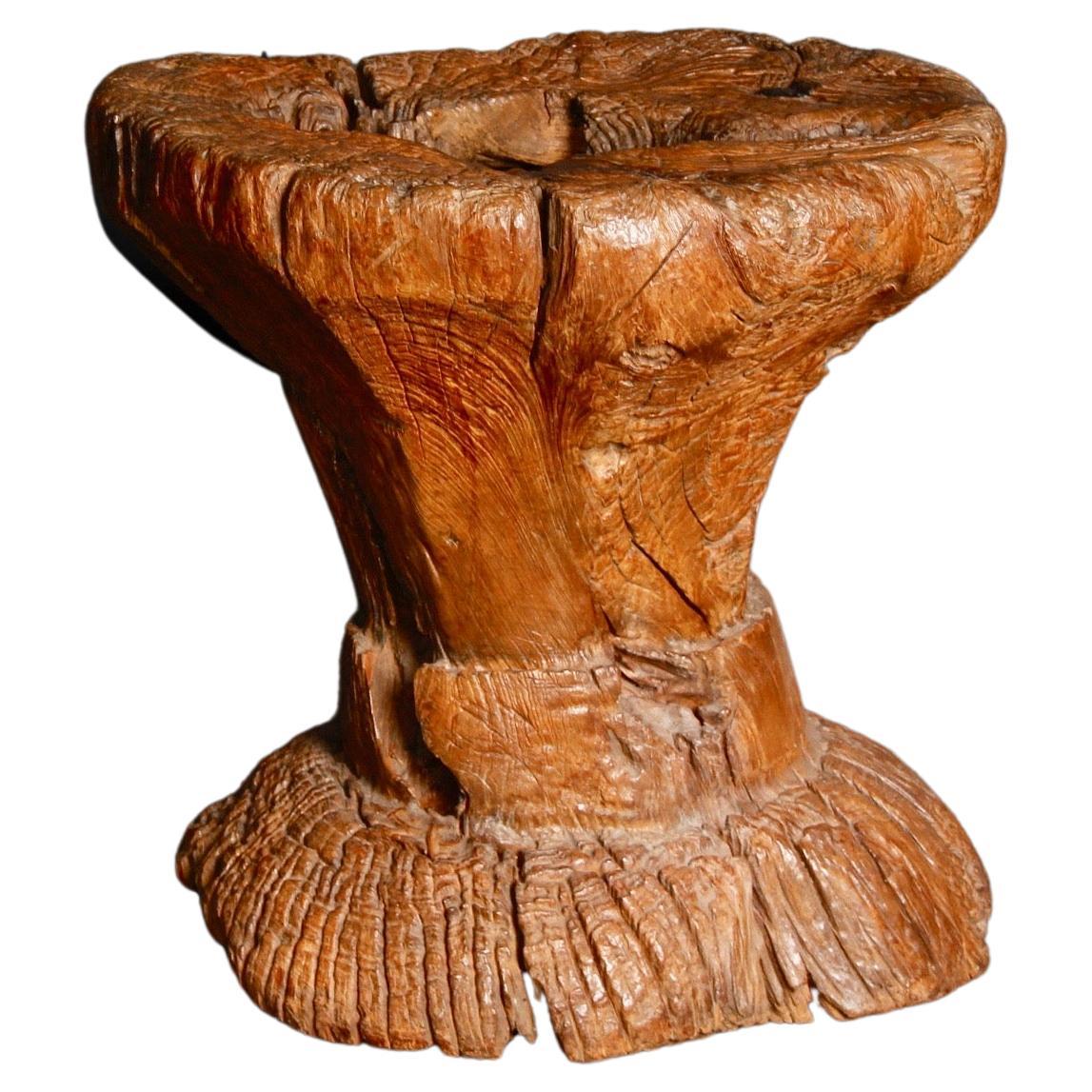 Mortar carved in a probably very old trunk For Sale