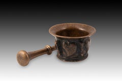 Mortar with pestle. Bronze. 16th century