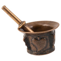 Mortar with pestle. Bronze. 16th century