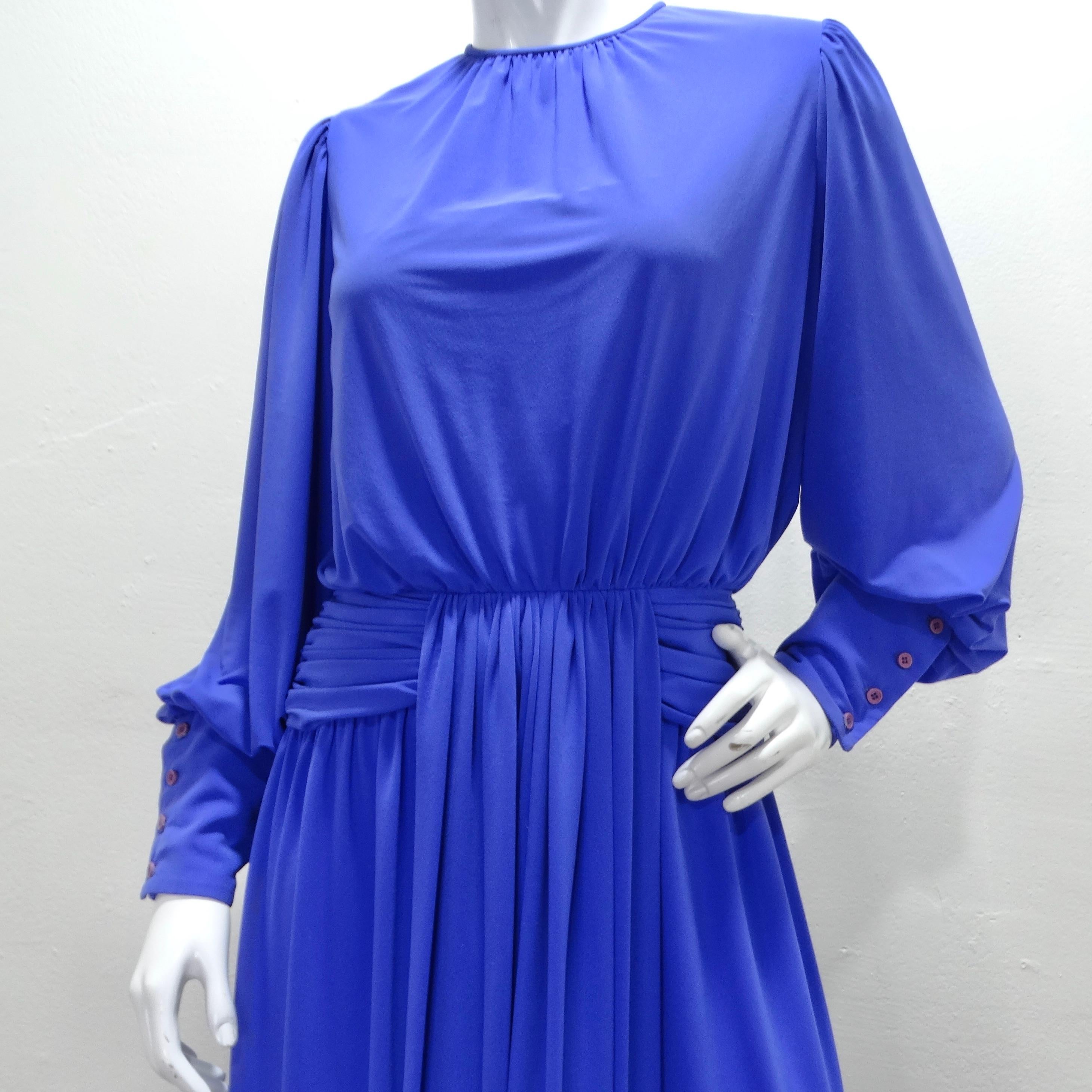 Do not miss out on the Morton Myles 1980s Grecian Blue Long Sleeve Draped Gown – a mesmerizing blend of elegance and contemporary style that will leave a lasting impression wherever you make an entrance. This captivating maxi dress, in a vibrant and