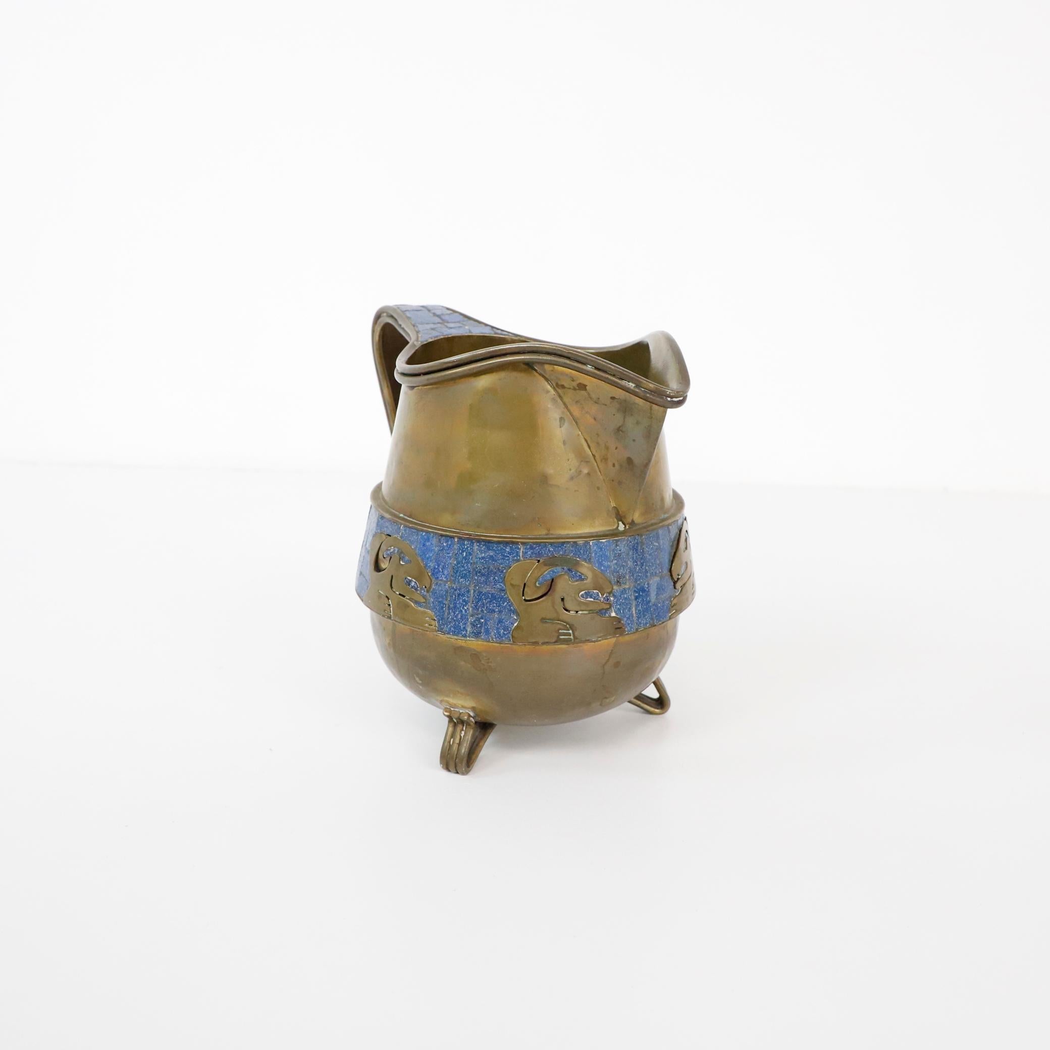 antique brass pitcher