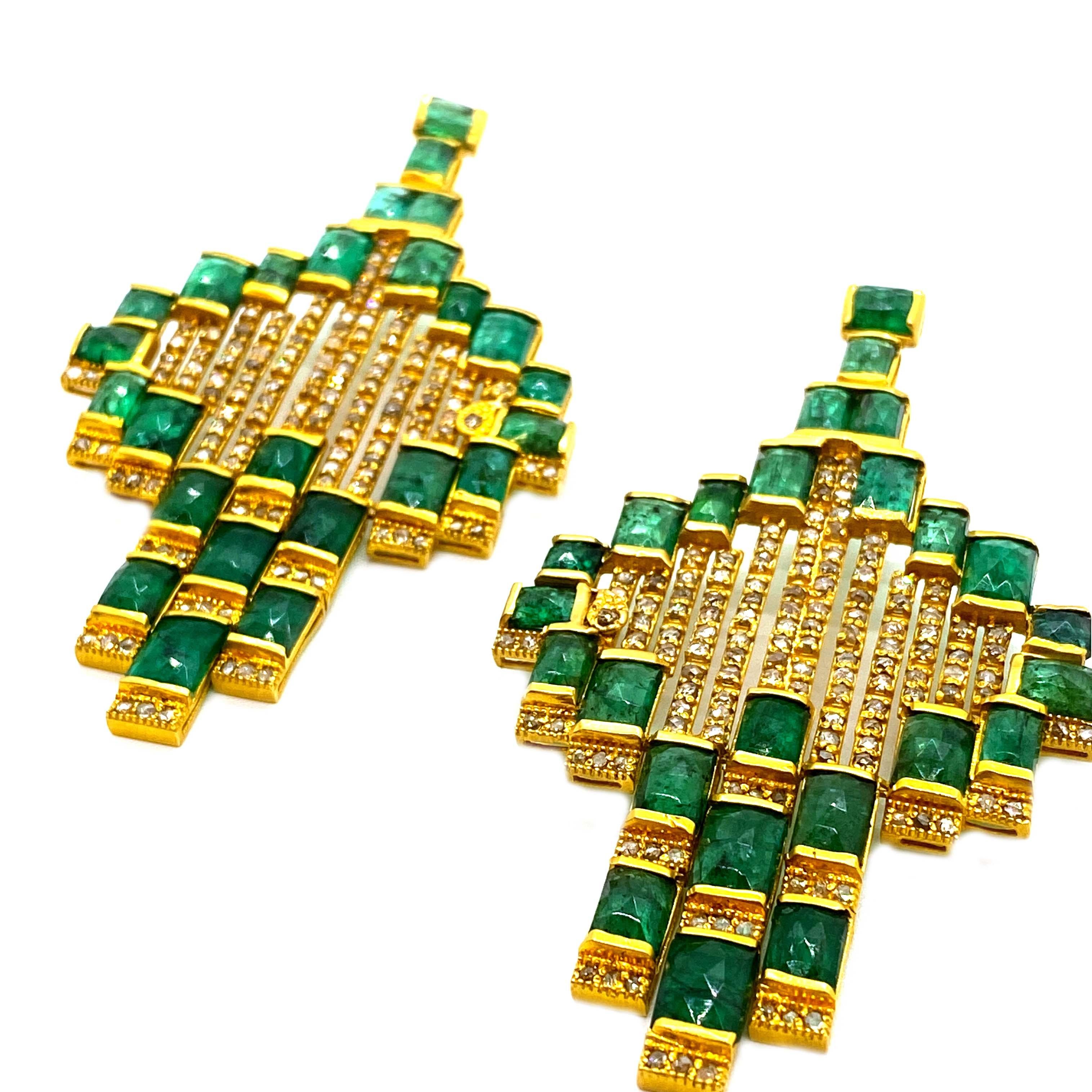 A stunning and unique Emerald Earrings are showcasing at 20K Yellow Gold and approximately 30.62cts Emerald, set in an intricately designed and handcrafted, with Diamonds at 4.93cts. Each Coomi piece is determined to be a one of a kind item. These
