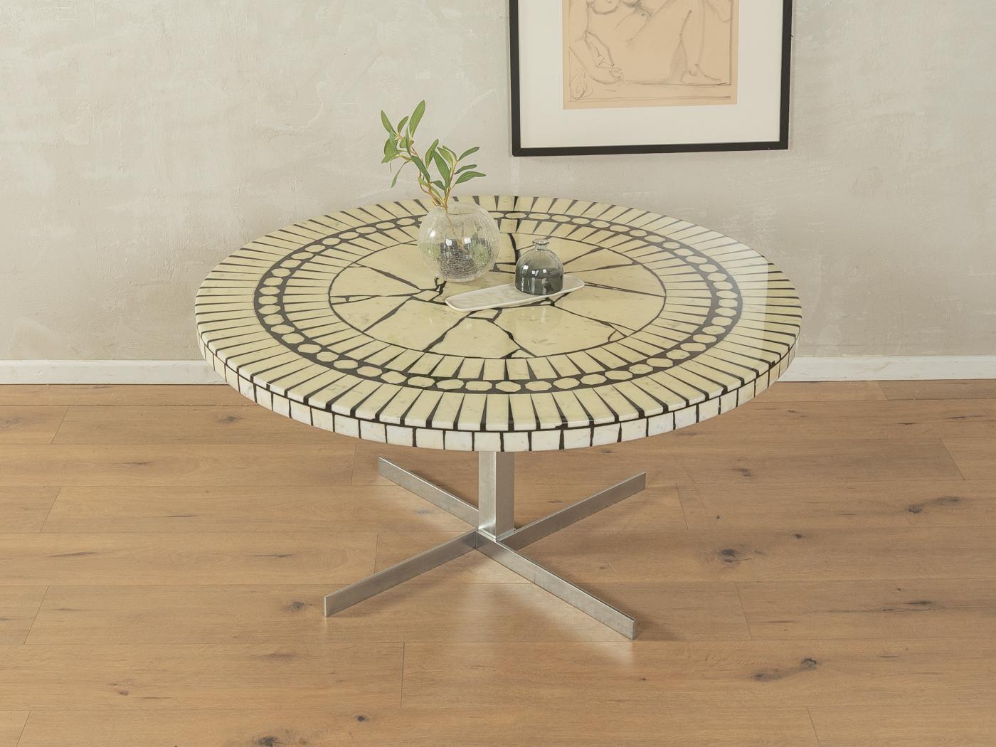 Unique coffee table by Berthold Müller-Oerlinghausen from the 1960s. High quality table top with mosaic in off white and black and stainless steel legs.

Quality Features:
very good workmanship
high-quality materials
Made in Germany, Designer: