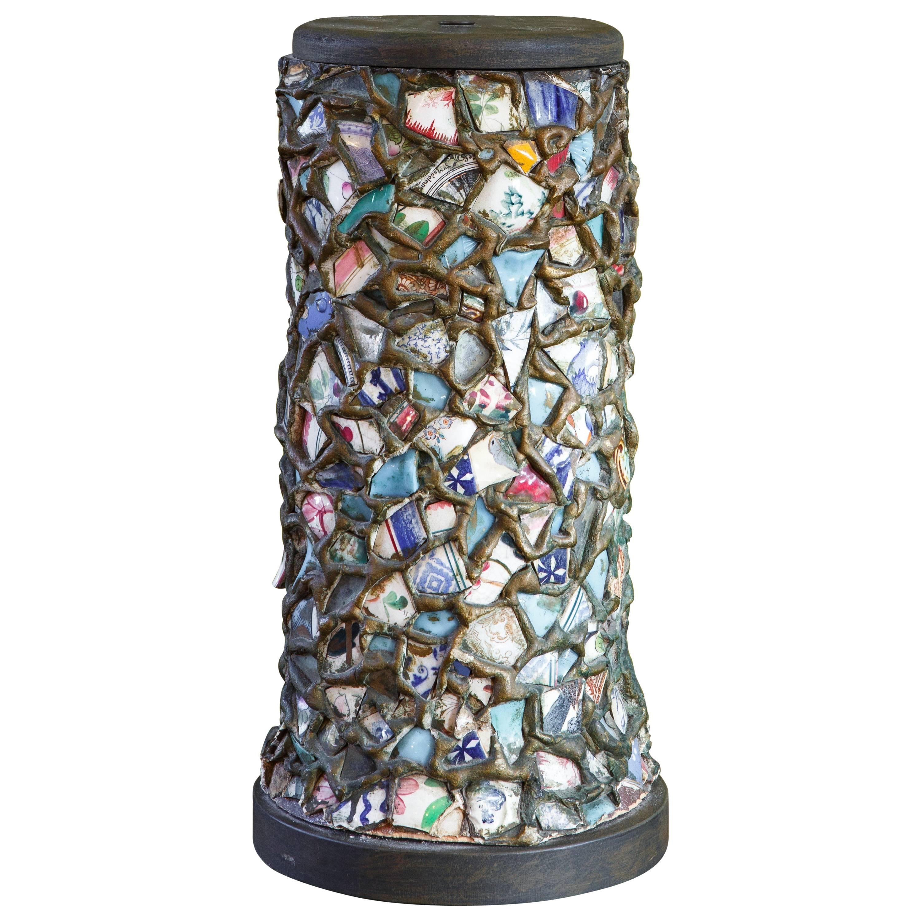 Mosaic memory ware table lamp from broken pieces of porcelain. This charming lamp was found in France and is truly a one-of-a-kind piece of art. The background 