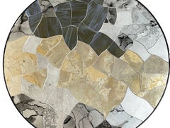 Tavolino da caffè rotondo moderno con piano a specchio e base in metallo di Ercole Home