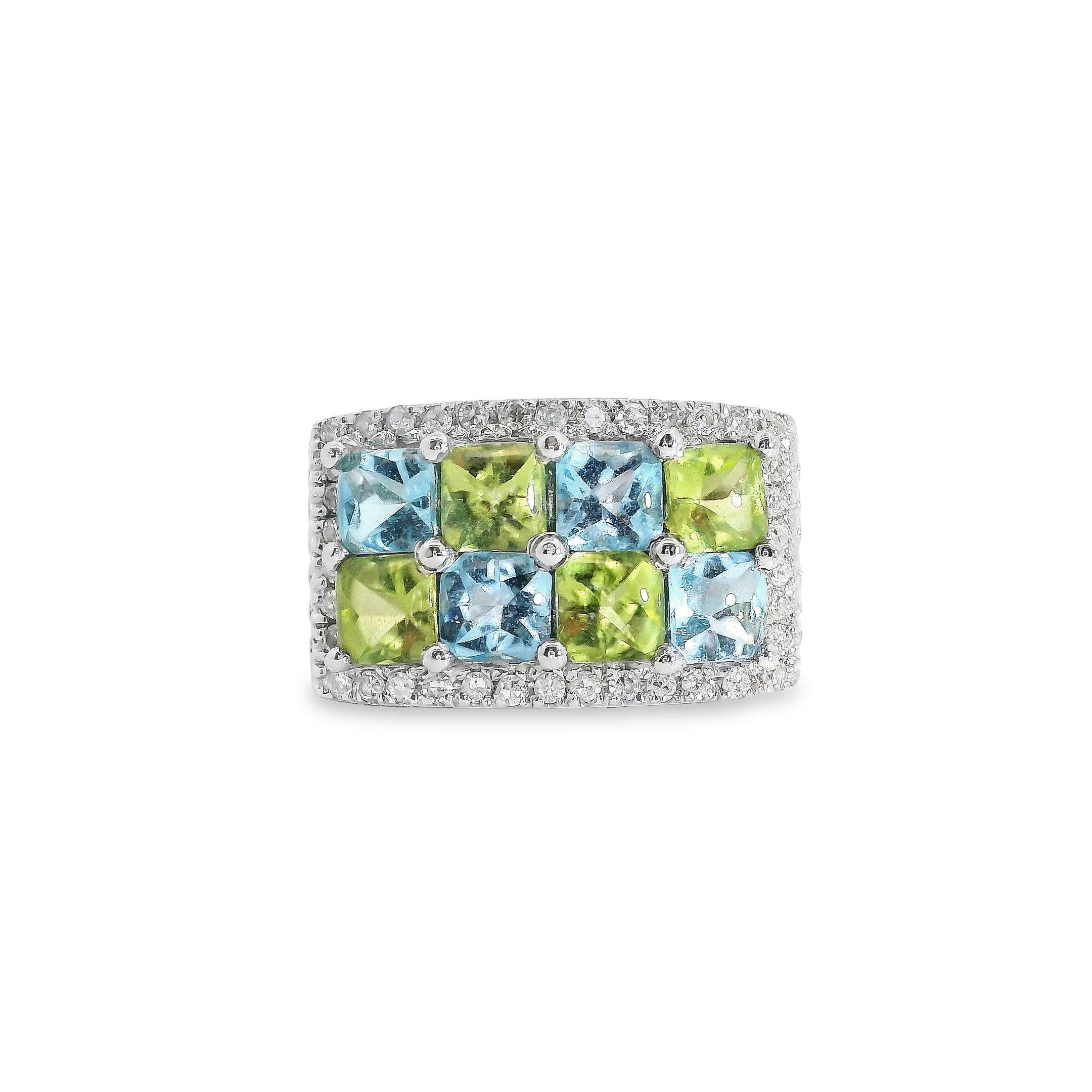 Experience the enchantment of spring with this opulent set featuring a luxurious peridot, blue topaz, and diamond ring and earrings. Immerse yourself in the splendor of nature as vibrant green and blue hues dance gracefully in these expertly cut