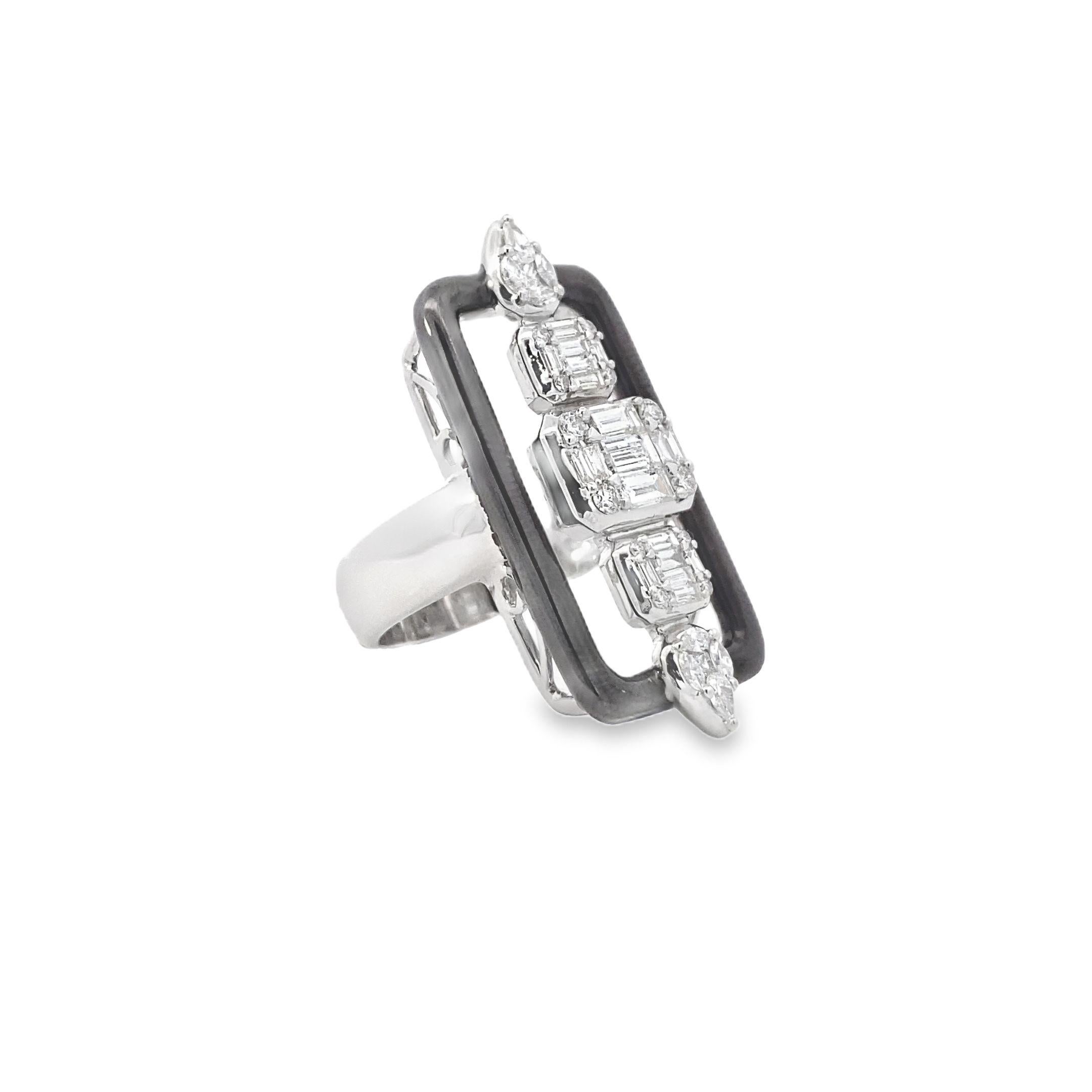 This exquisite modern ring showcases a stunning mosaic-style design, crafted from 18k white gold. The centerpiece of the ring features a mesmerizing display of white baguette diamonds totaling 1.79 carats, complemented by prong-set white multi-shape