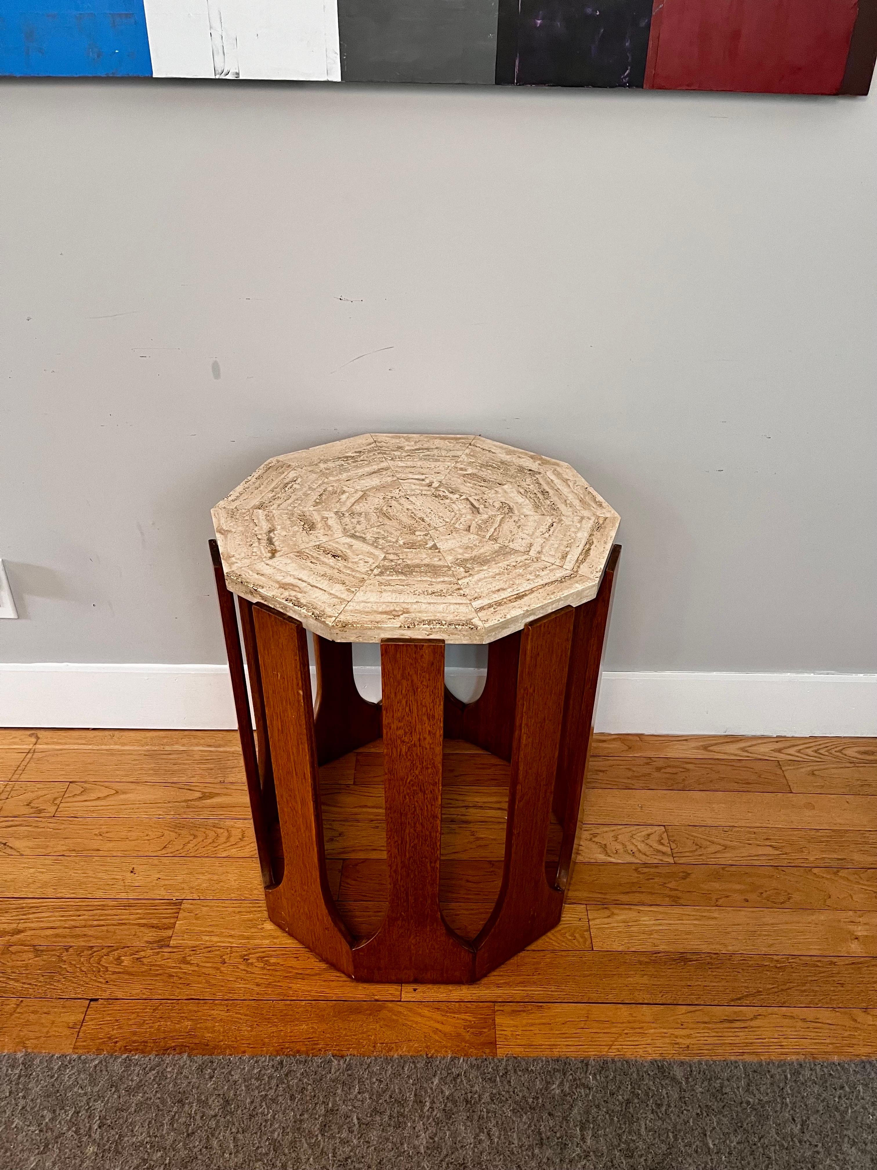 Mosaic Travertine Occasional Table or End Table 
by Harvey Probber, circa 1950

10 sided decagon travertine / stone faceted top on ply-wood base (ply-wood is not visible). Top is removable. Base is believed to be mahogany with medium brown