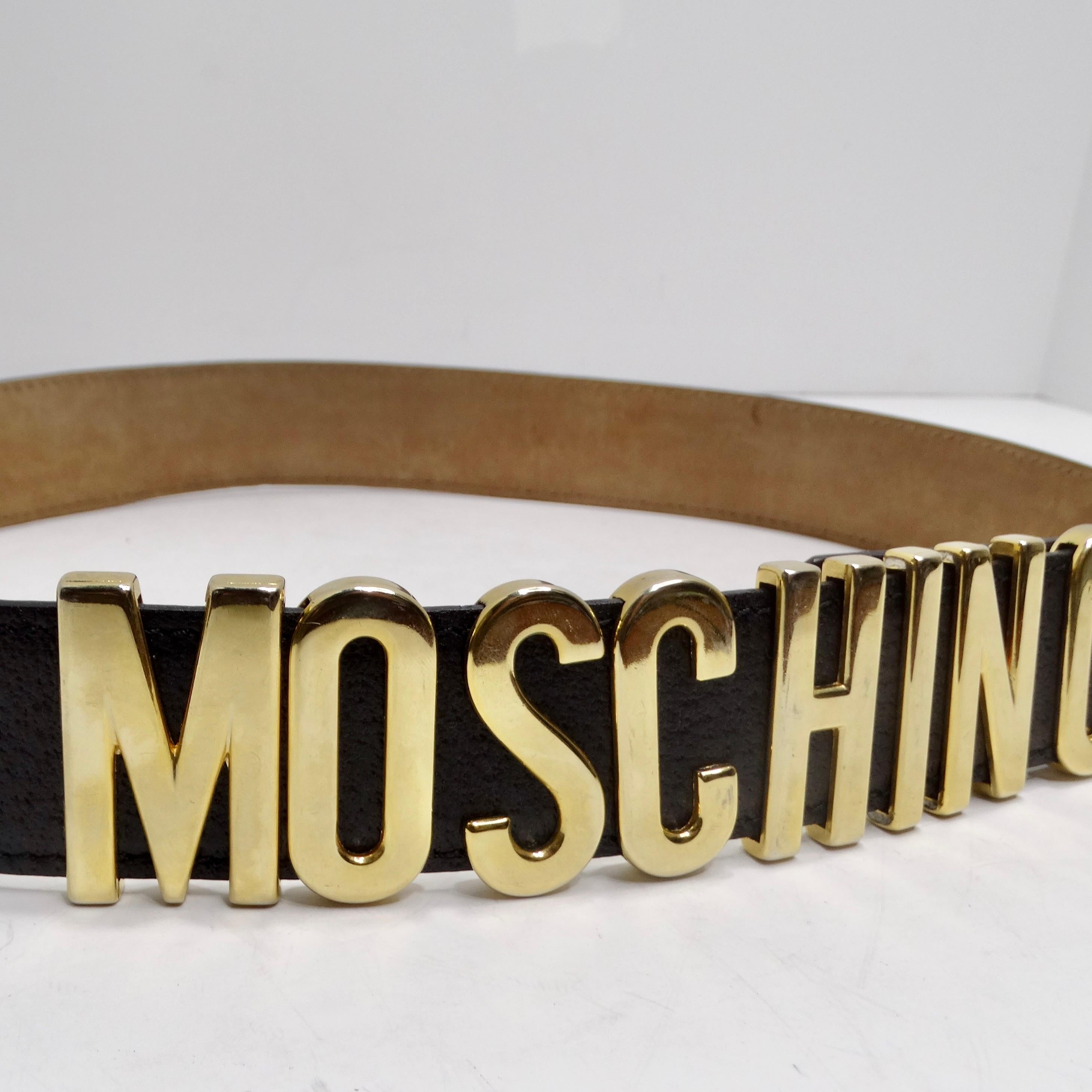 Women's or Men's Moschino 1990s Gold Tone Logo Black Leather Belt For Sale