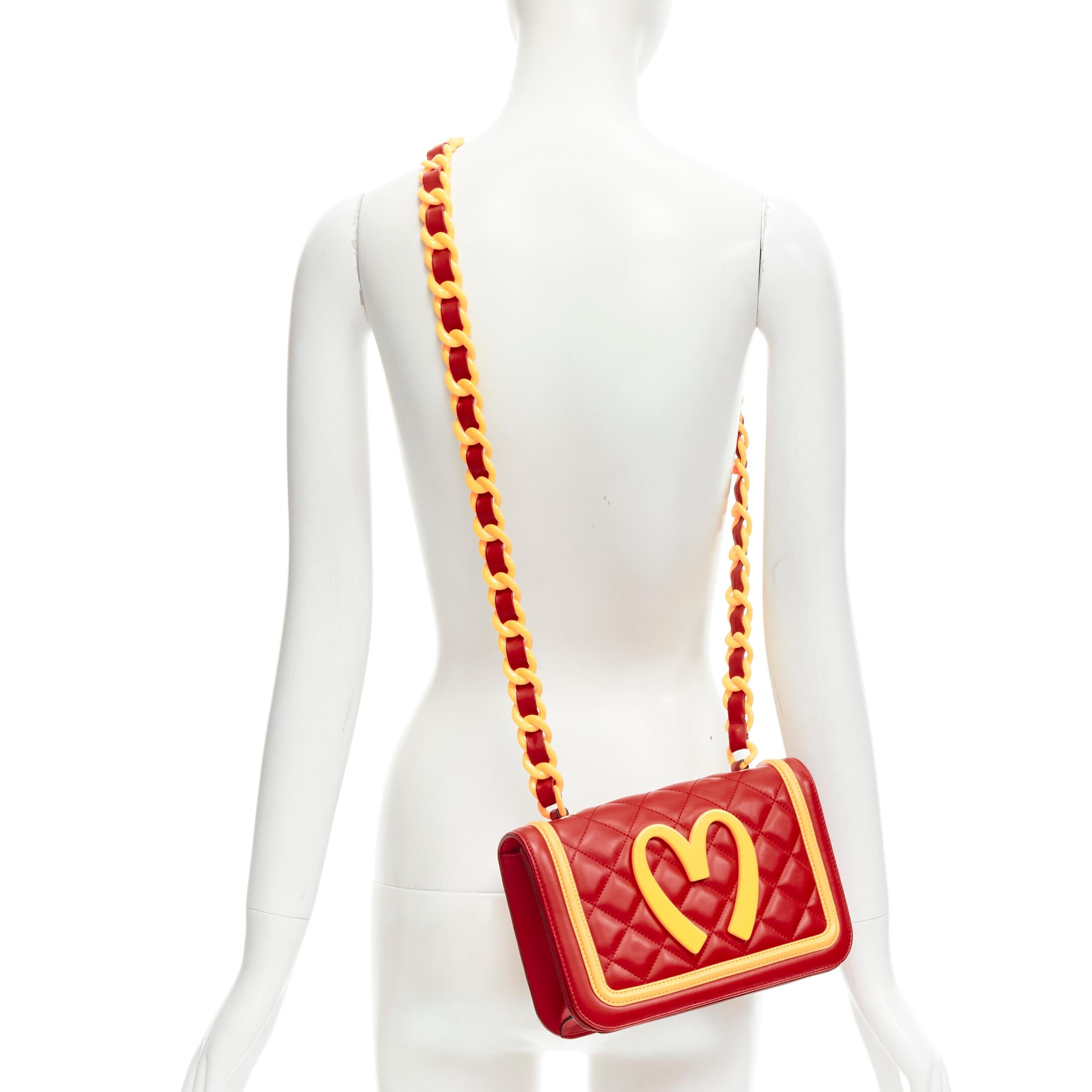 MOSCHINO 2014 Runway Mcdonalds Fast Food red yellow quilted crossbody flap bag
Brand: Moschino
Designer: Jeremy Scott
Collection: AW2014 Runway
Material: Leather
Color: Red
Pattern: Solid
Closure: Magnet
Extra Detail: Diamond quilted leather with