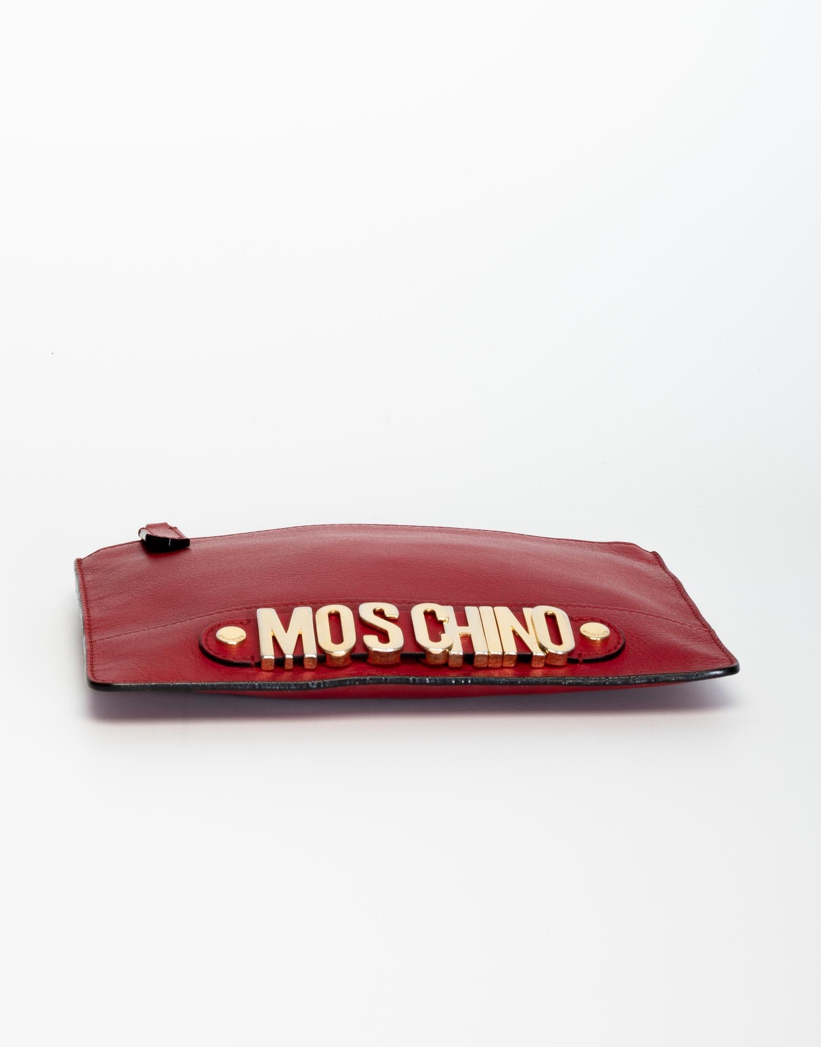 red leather clutch bag