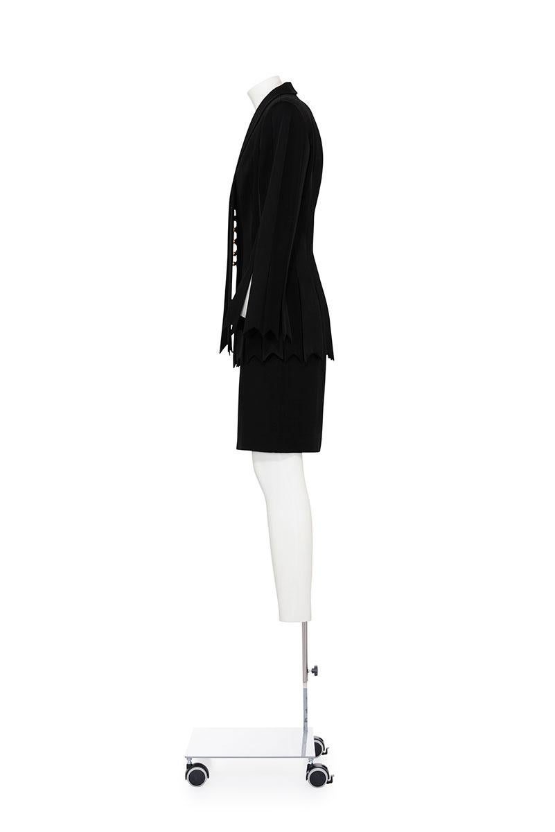 90's iconic and rare Cheap and Chic fringed suit by Moschino
Matt and shiny fringes
Golden ball buttons
Fully lined
Pencil skirt
79% acetate 21% rayon 

No tag size, fits like a M

Jacket
Shoulder 41 cm
Width 45 cm
Length 70 cm

Skirt
Waist 36