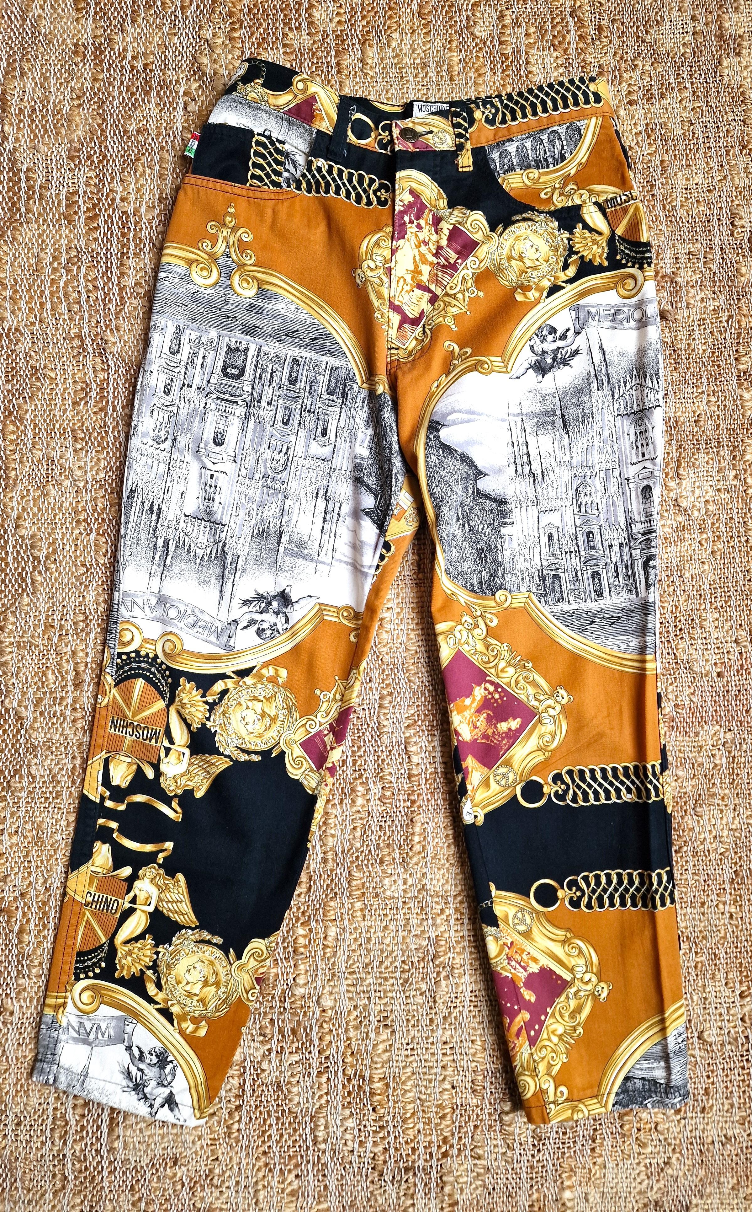 Vintage 90's Moschino baroque print pants! Baroque frames, catherdral,  chains, coins, gravures, teddy bear etc. Looks fabulous!
Milan cathedral scenery!

100% cotton.
EXCELLENT condition!

SIZE
Medium.
Marked size: 30.
Length: 89 cm / 35