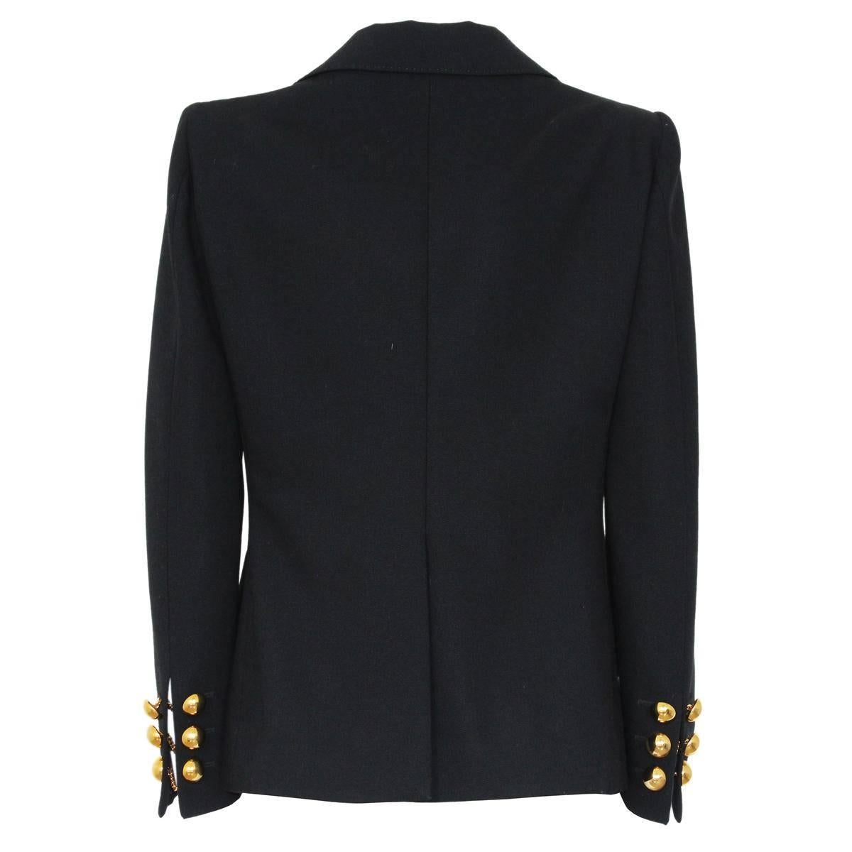 So beautiful Moschino jacket
Wool 
Black color
Amazing golden 