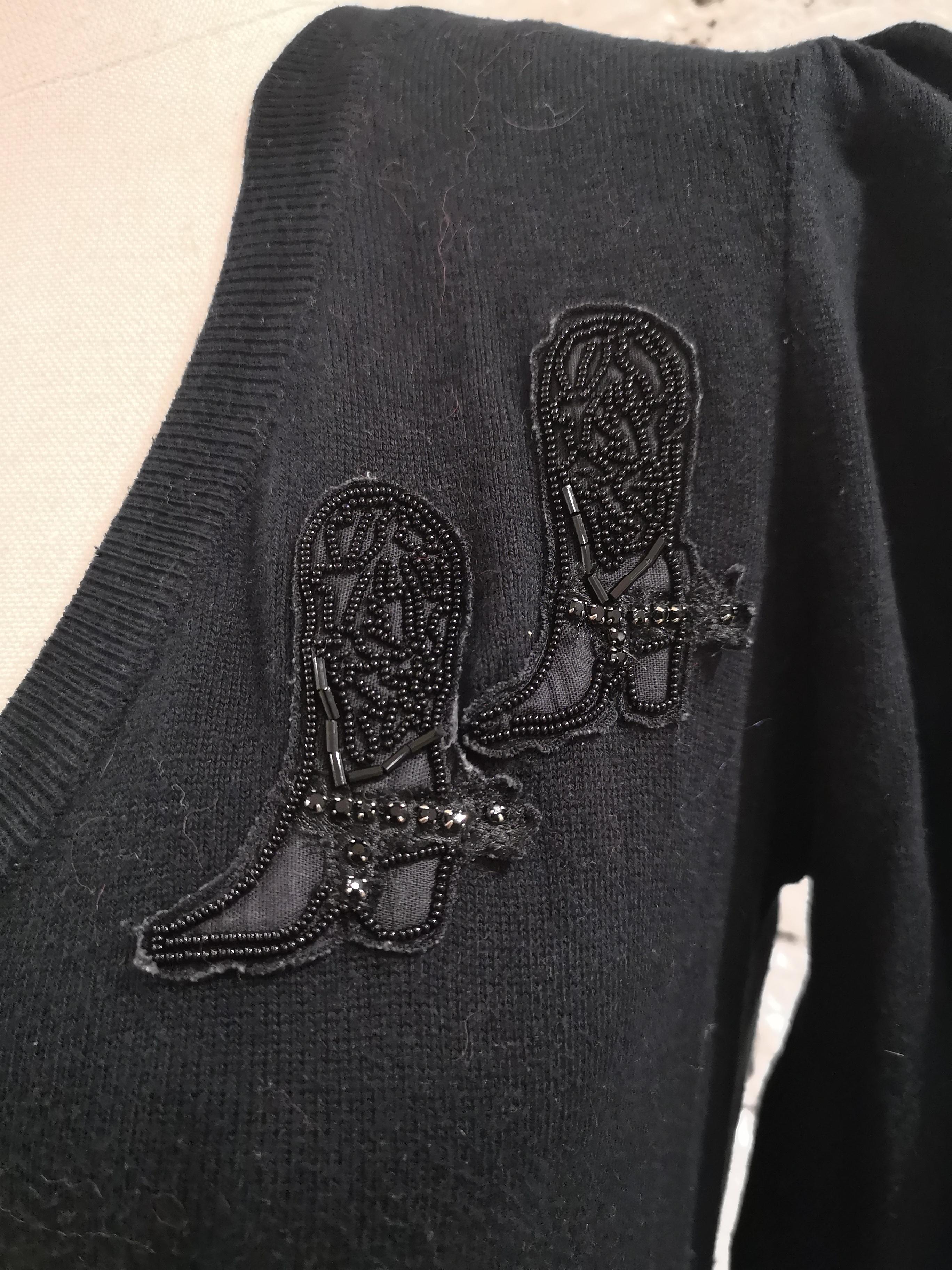 Black Moschino black boots wool pull For Sale