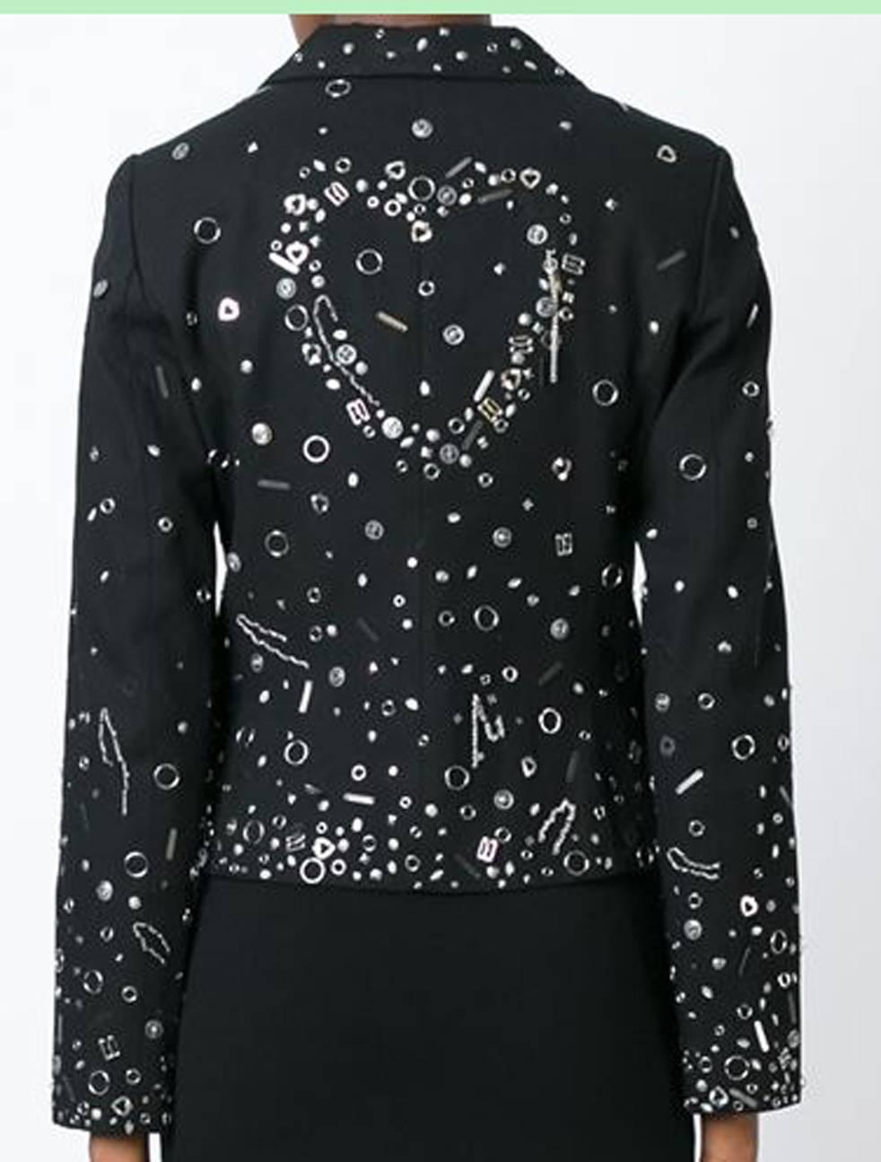 Gorgeous Moschino black stretch cotton embellished blazer featuring notched lapels, a button fastening, flap pockets and long sleeves. 
In good vintage condition. Made in Italy.
Estimated size: 36fr/ US4/ UK8
Chest 35,4in. (90cm)
Waist 30,7in