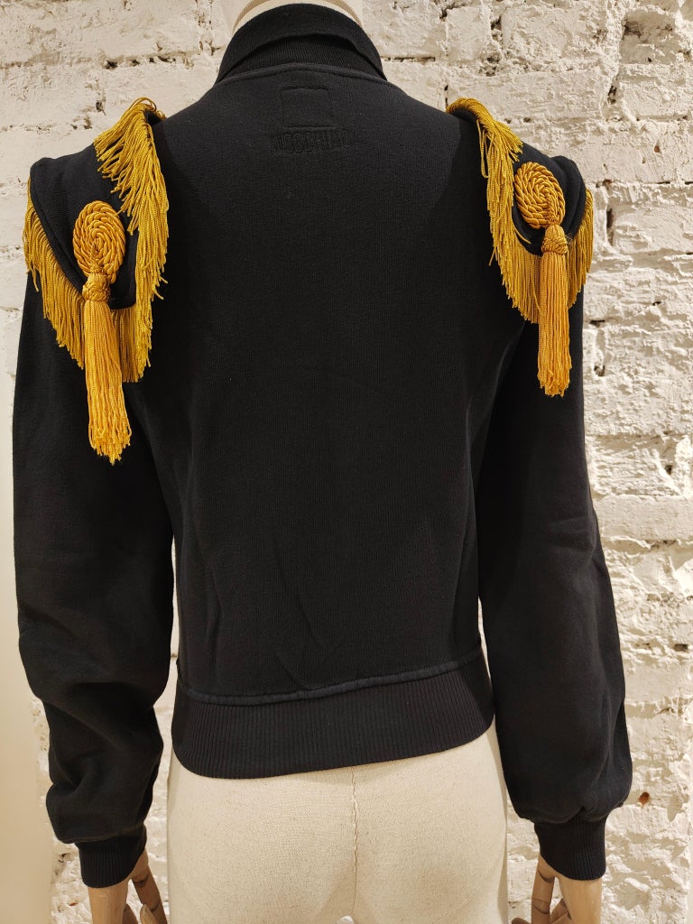 Moschino black cotton gold fringes sweater 
totally made in italy in size 44
