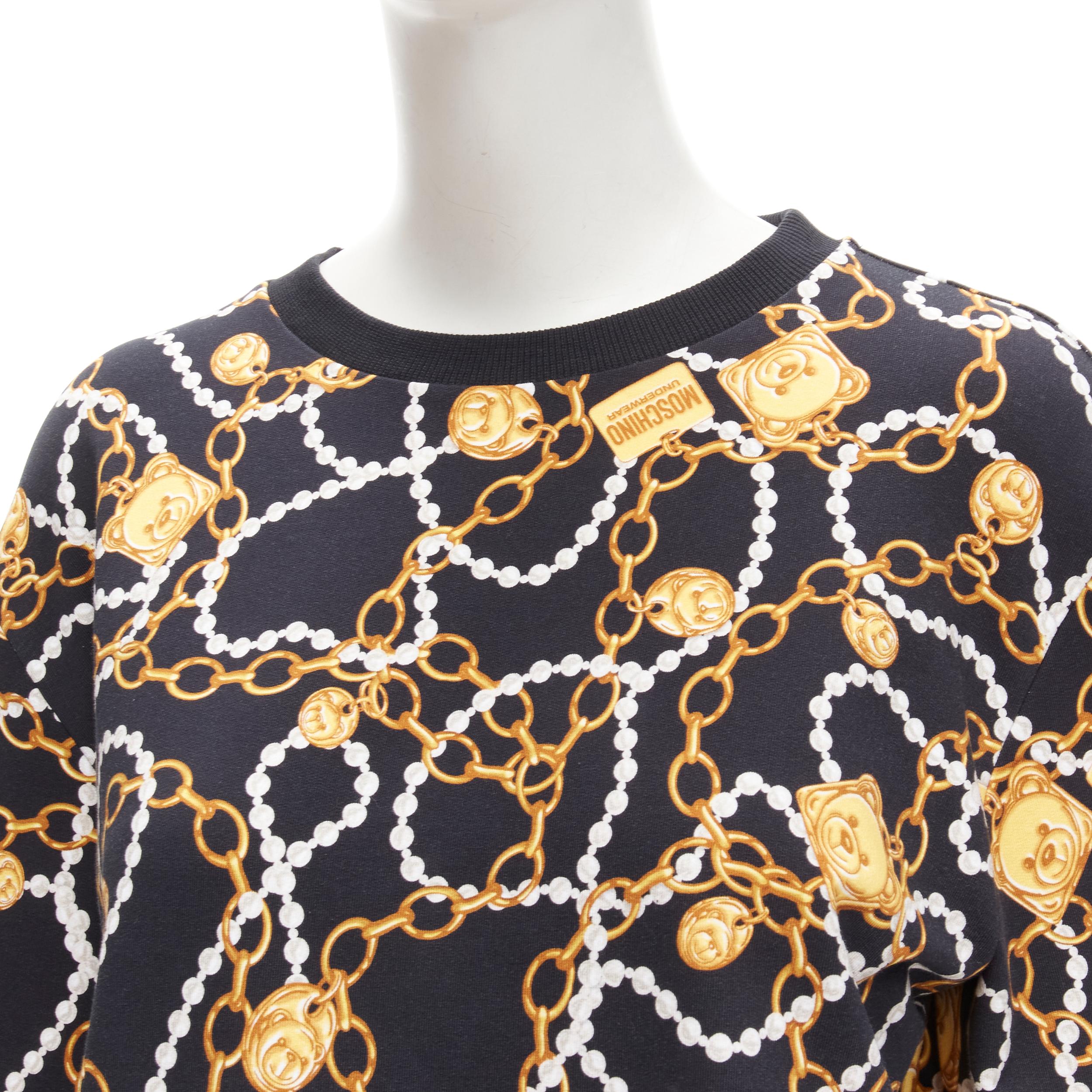 MOSCHINO black gold teddy bear chain pearl print sweatshirt S
Reference: AAWC/A00256
Brand: Moschino
Collection: Underwear label
Material: Cotton, Blend
Color: Black, Gold
Pattern: Chain
Closure: Pullover
Made in: Bulgaria

CONDITION:
Condition: