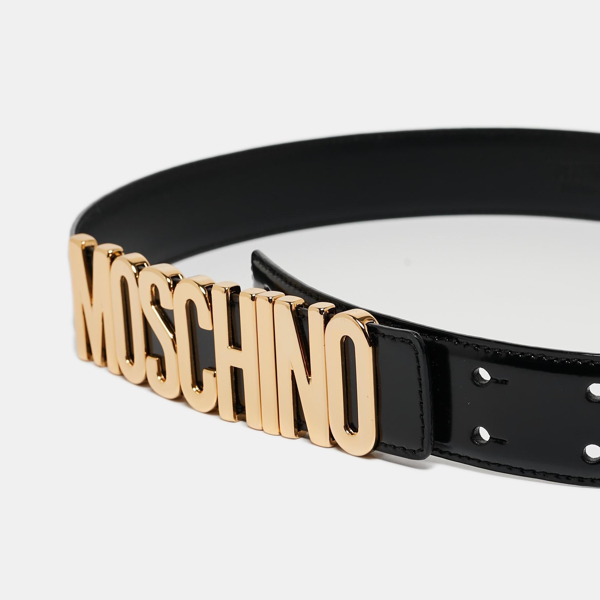 Moschino’s logo belt is crafted from black leather and presents a strong statement. The front is adorned with gold-tone brand lettering giving it a bold look. Style this belt over your dresses, pants, and skirts for a stylish revamp.

Includes: