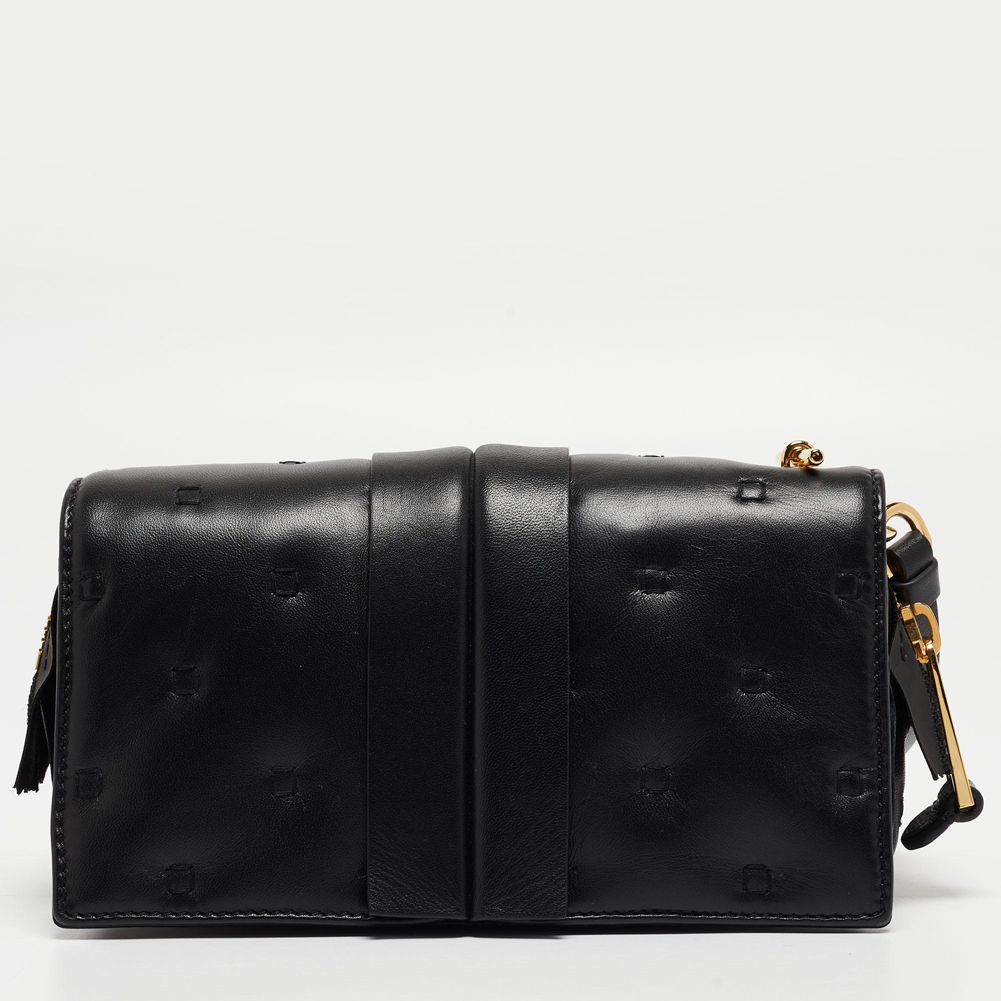 Functional and fashionable, this clutch is a classy styling choice. It is crafted from quality materials, and its lined interior will keep your evening essentials in a neat way.

Includes: Original Dustbag

