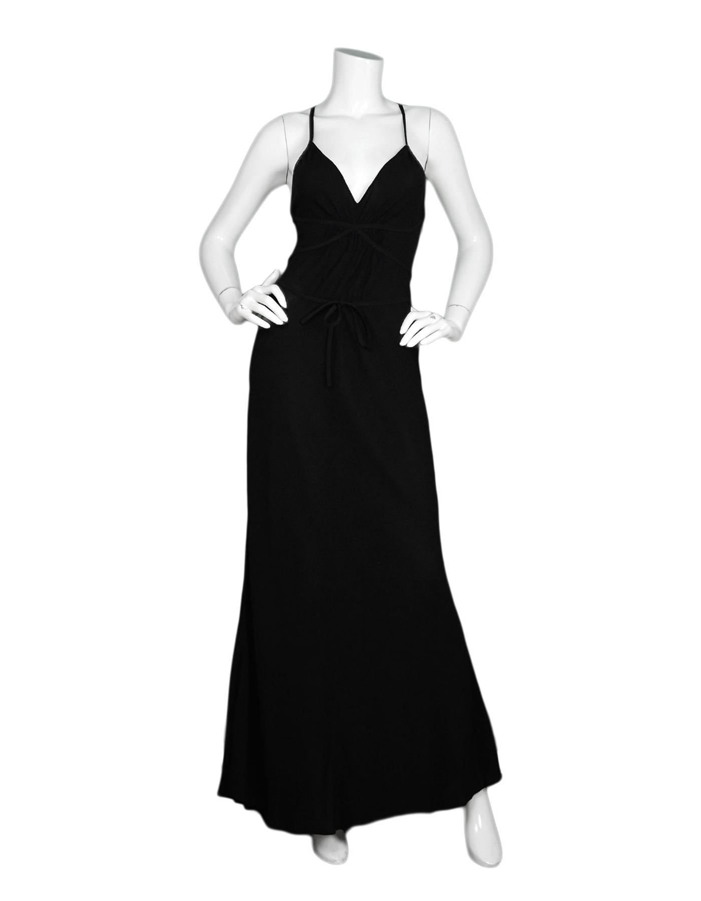 Moschino Black Silk Spaghetti Strap Gown Sz 8 NWT

Made In: Italy
Color: Black
Materials: 100% silk
Opening/Closure: Hidden side zipper with hook eye at top
Overall Condition: Excellent condition with original tags attached 
Estimated Retail: $1,190