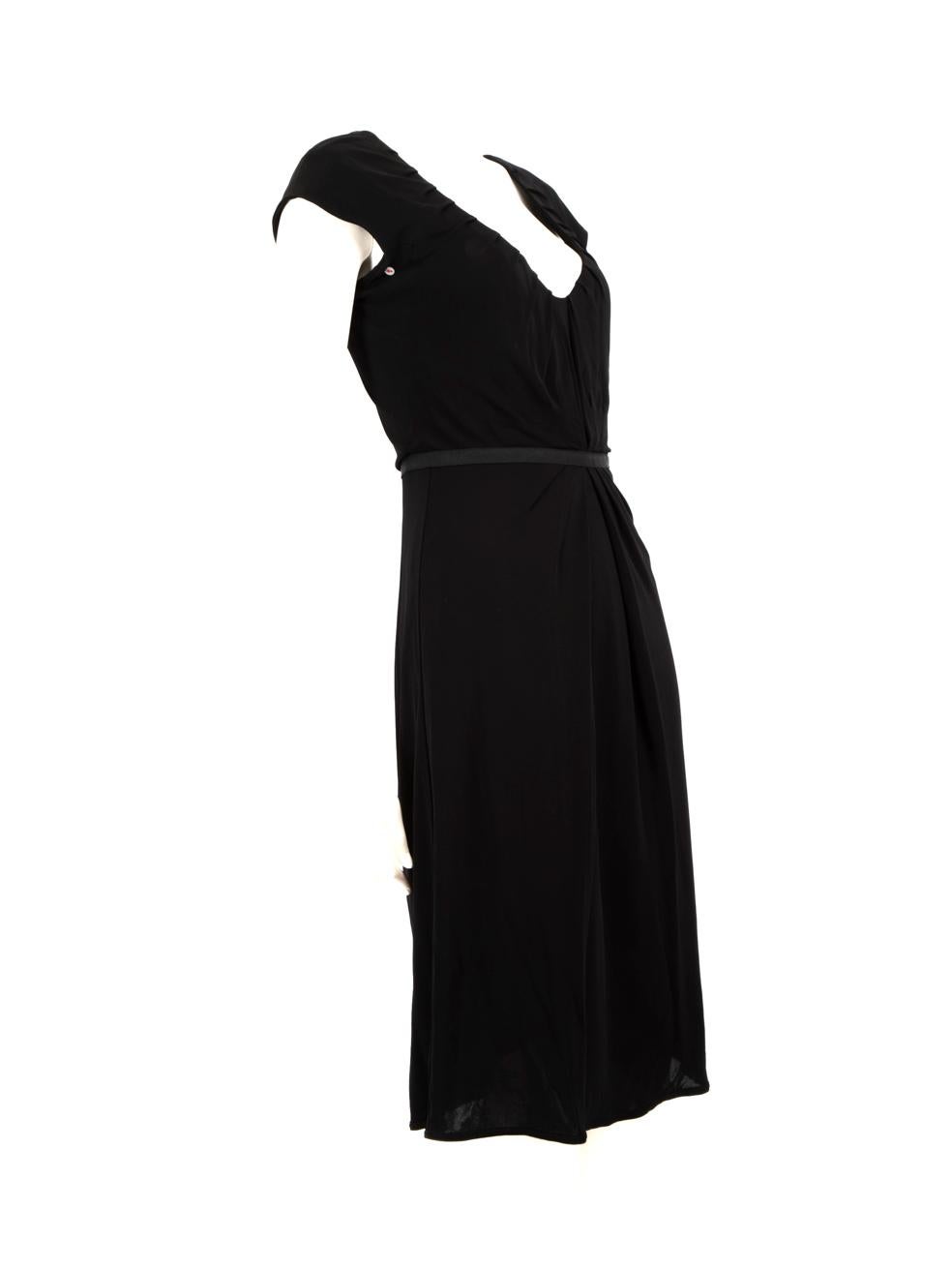 CONDITION is Good. Minor wear to the dress is evident. There is discolouration around the lining of the neckline, the inner and outer underarms and the lining of the hem. Small tear to the end of the side zip on this used Moschino designer resale