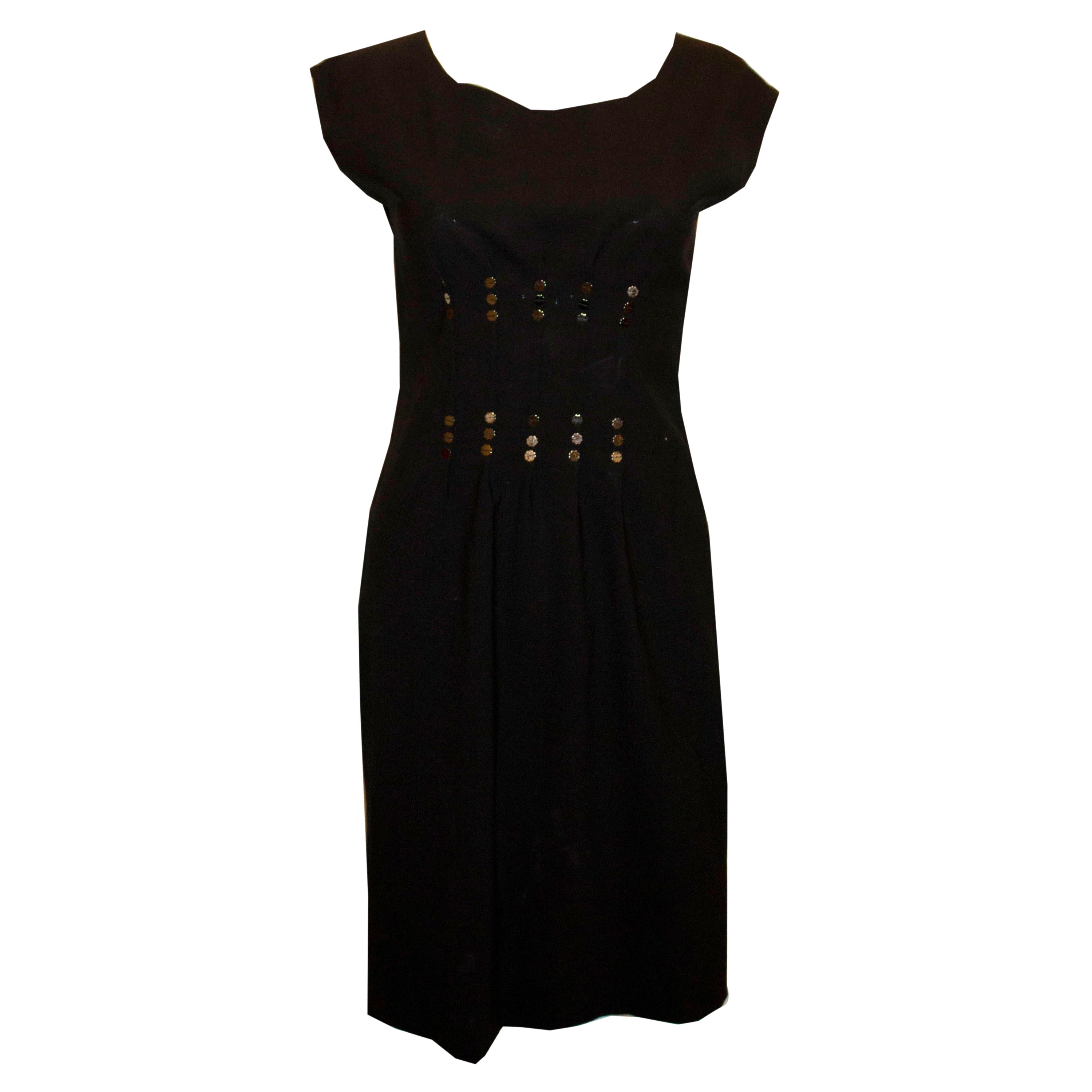 Moschino Schwarzes Cocktailkleid aus Wolle mit Paillettendetails