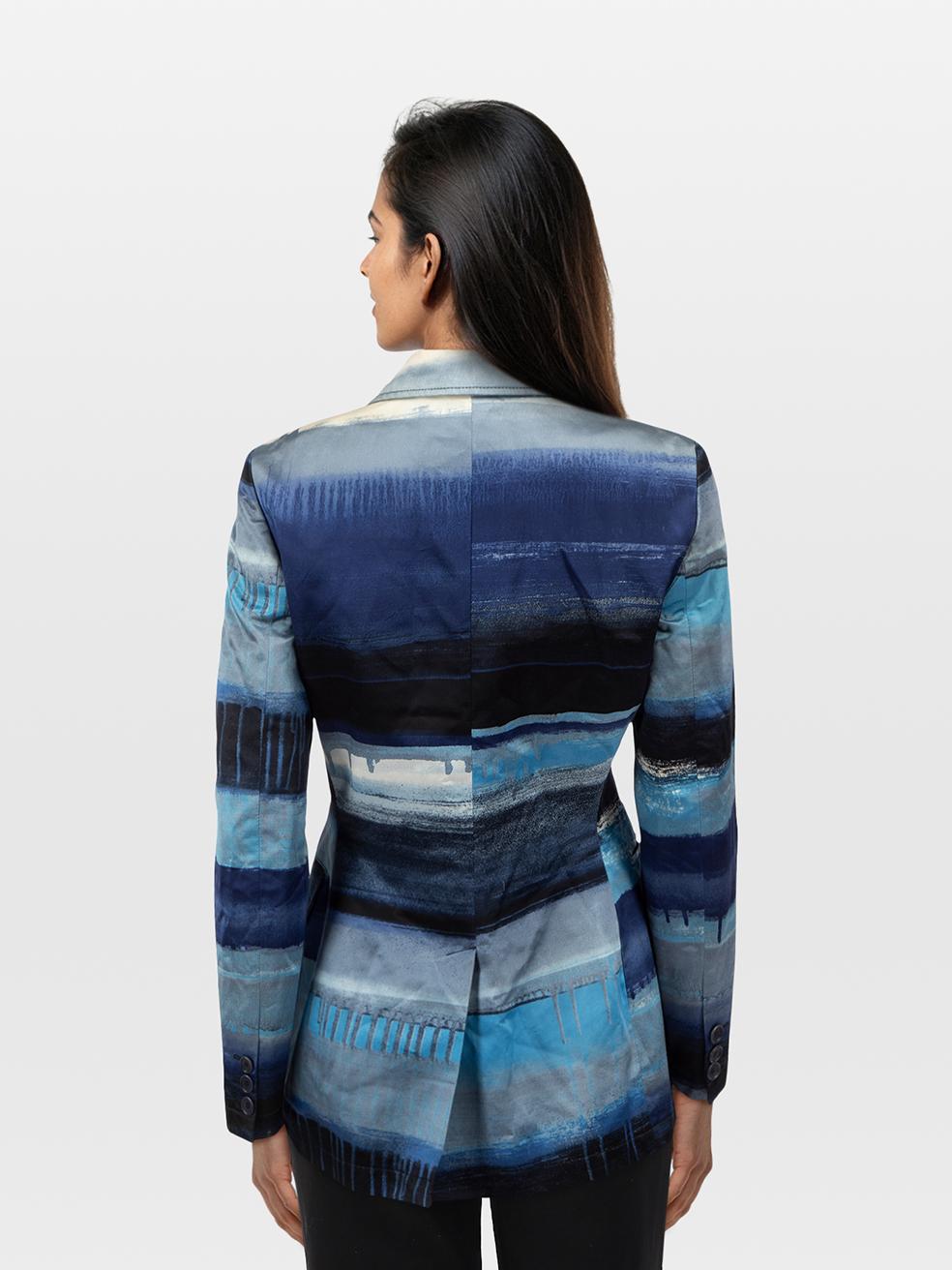 CONDITION is Very good. Minimal wear to the jacket is evident. Discolouration around the neckline, front left, on the right sleeve and under both armpits on the lining on this used Moschino designer resale item. Discolouration may need gentle hand
