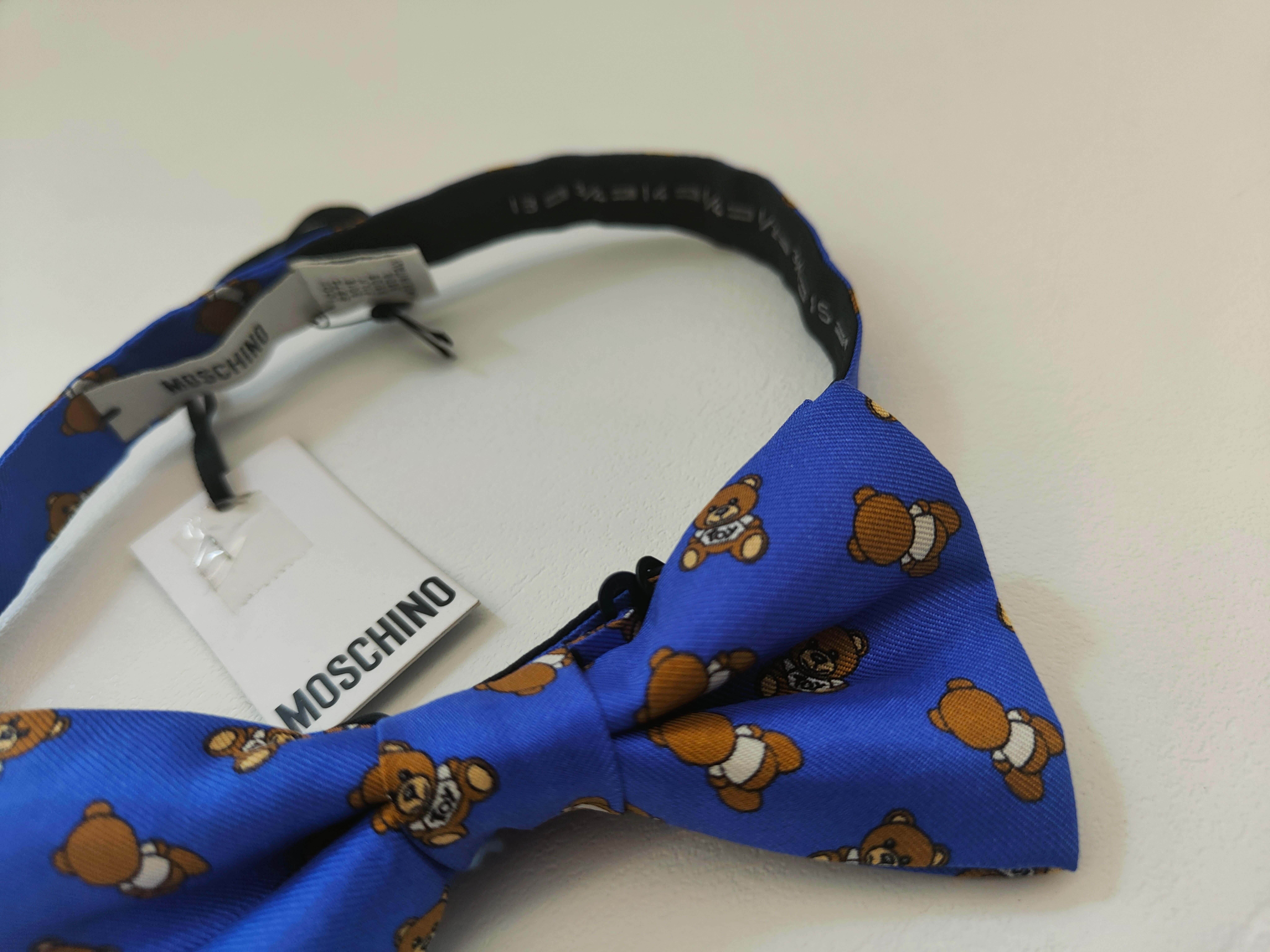 Moschino Blue multicoloured bow tie NWOT
100% silk