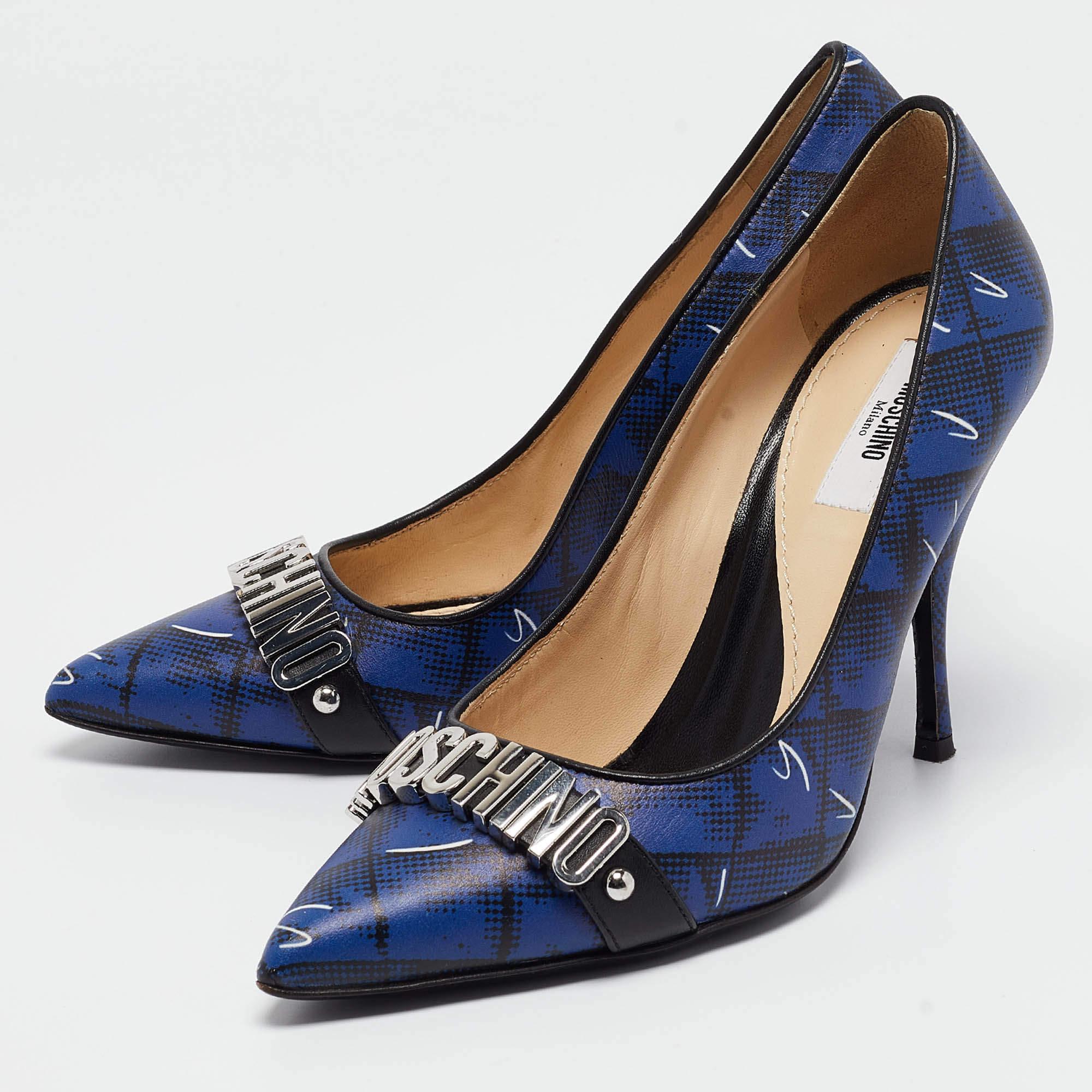 Create stunning awe inspiring looks with this Moschino creation. The pumps flaunt a classic blue exterior enhanced with the silver tone logo buckle detailing on the vamps. From the pointed toes to the 10cm high heels this pair is so beautiful that
