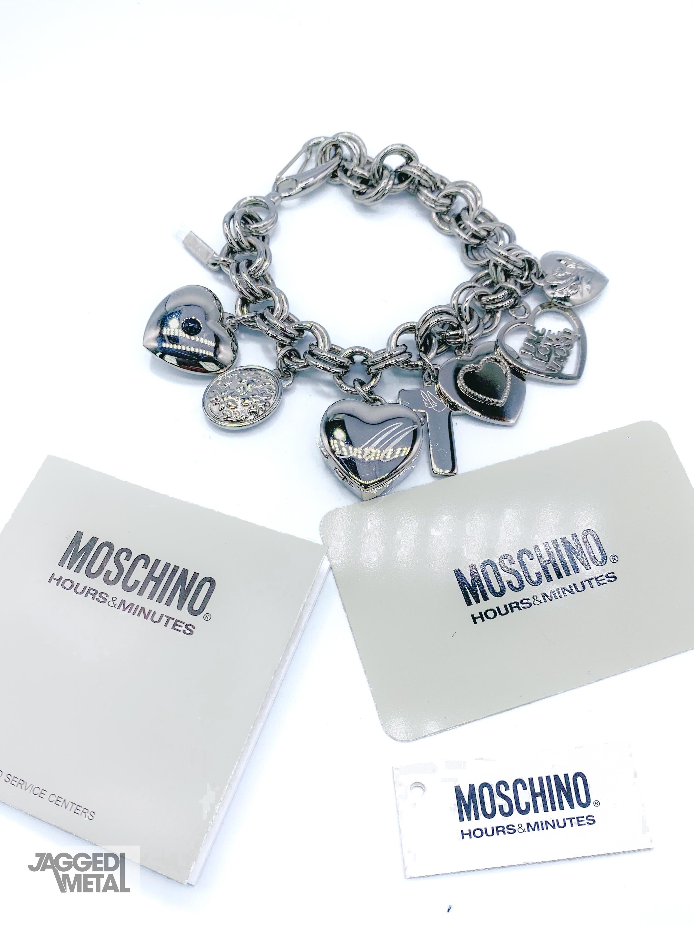 Moschino Y2k 'Live Love Laugh' Charm Bracelet with Watch

An incredible collectable statement piece from the iconic Moschino

Detail
-Made in the early 2000s from stainless steel
-Features 8 charms one of which is a heart shaped waterproof