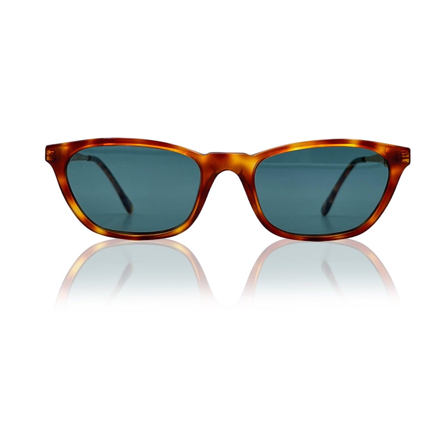 Brown acetate eyeglasses by Moschino by Persol. Rectangle design. Model: M55. 54/19 - 140 mm - logo on temples - New green glass mineral lense (Barberini). Brown tortoise front with gold metal ear stems with Moschino signatures on temples. Details