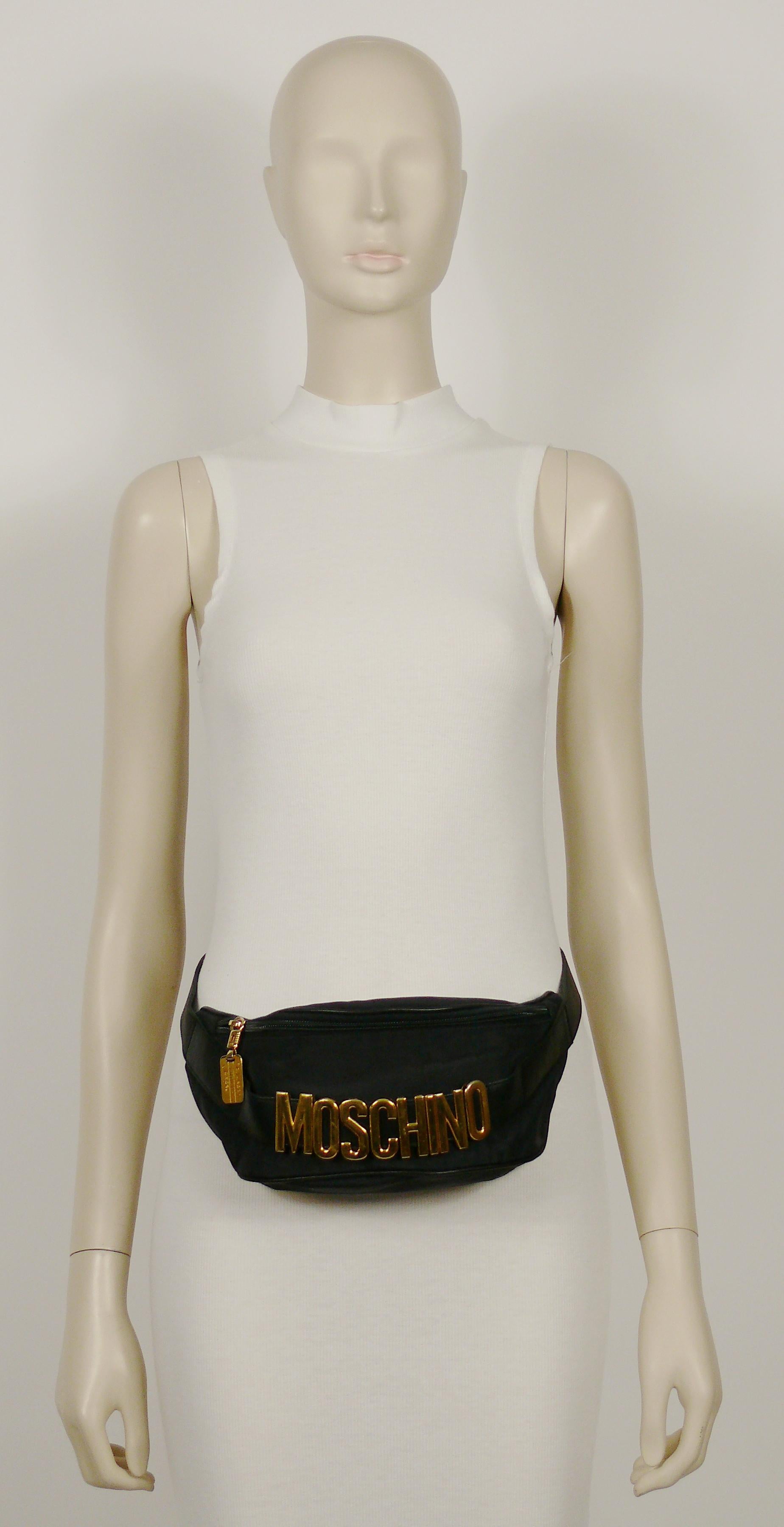 MOSCHINO by REDWALL vintage black fanny pack.

Thick nylon with leather strap and gold tone hardware.

One size fits all.
Adjustable leather straps.

Embossed Centropercento MOSCHINO Redwall Made in Italy.
Numbered model N°461002.
Black REDWALL logo