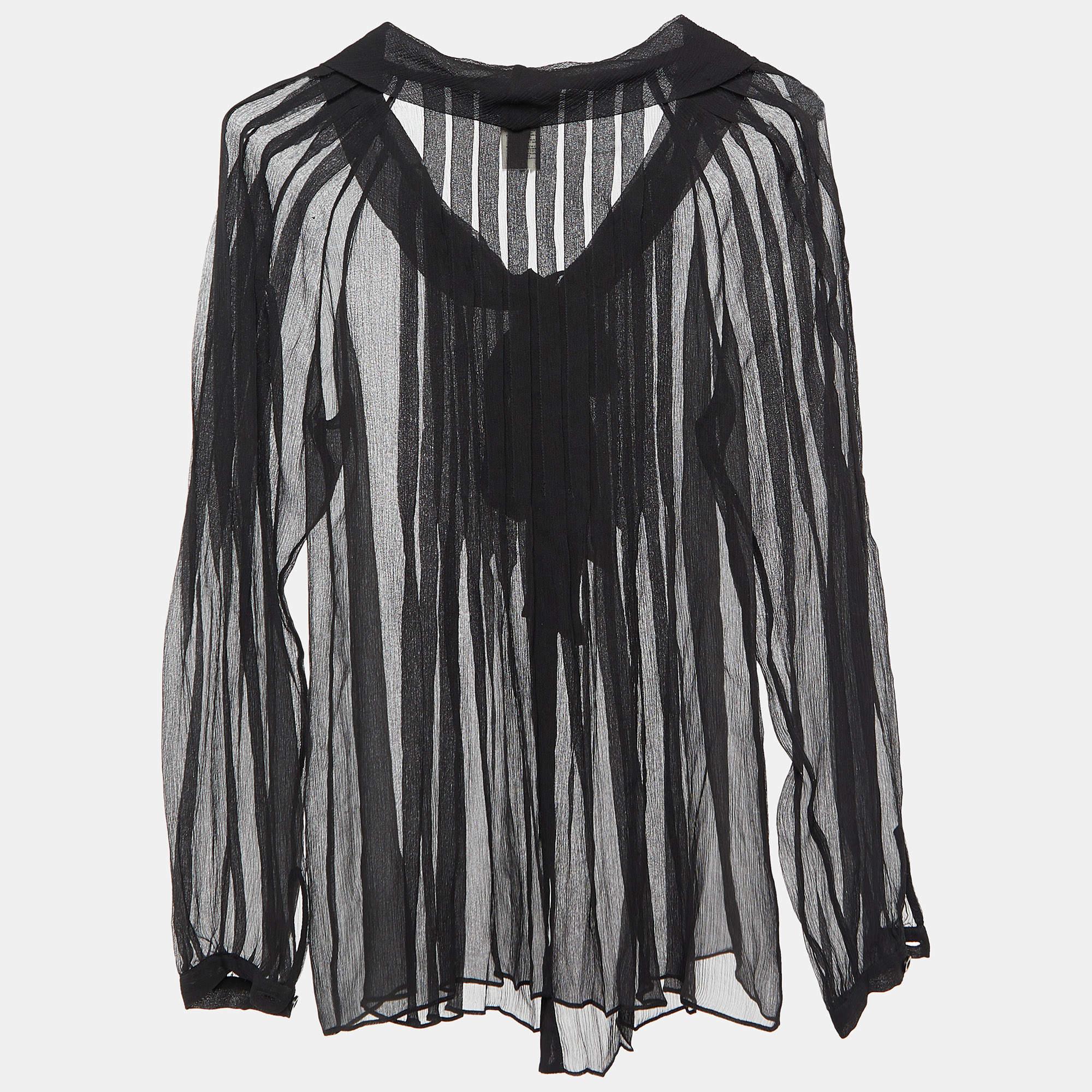 Completa la tua eleganza con una bella camicetta come questa. Con il suo design grazioso e il tessuto di prima qualità, questa blusa è la scelta migliore per apparire sofisticata e in equilibrio.