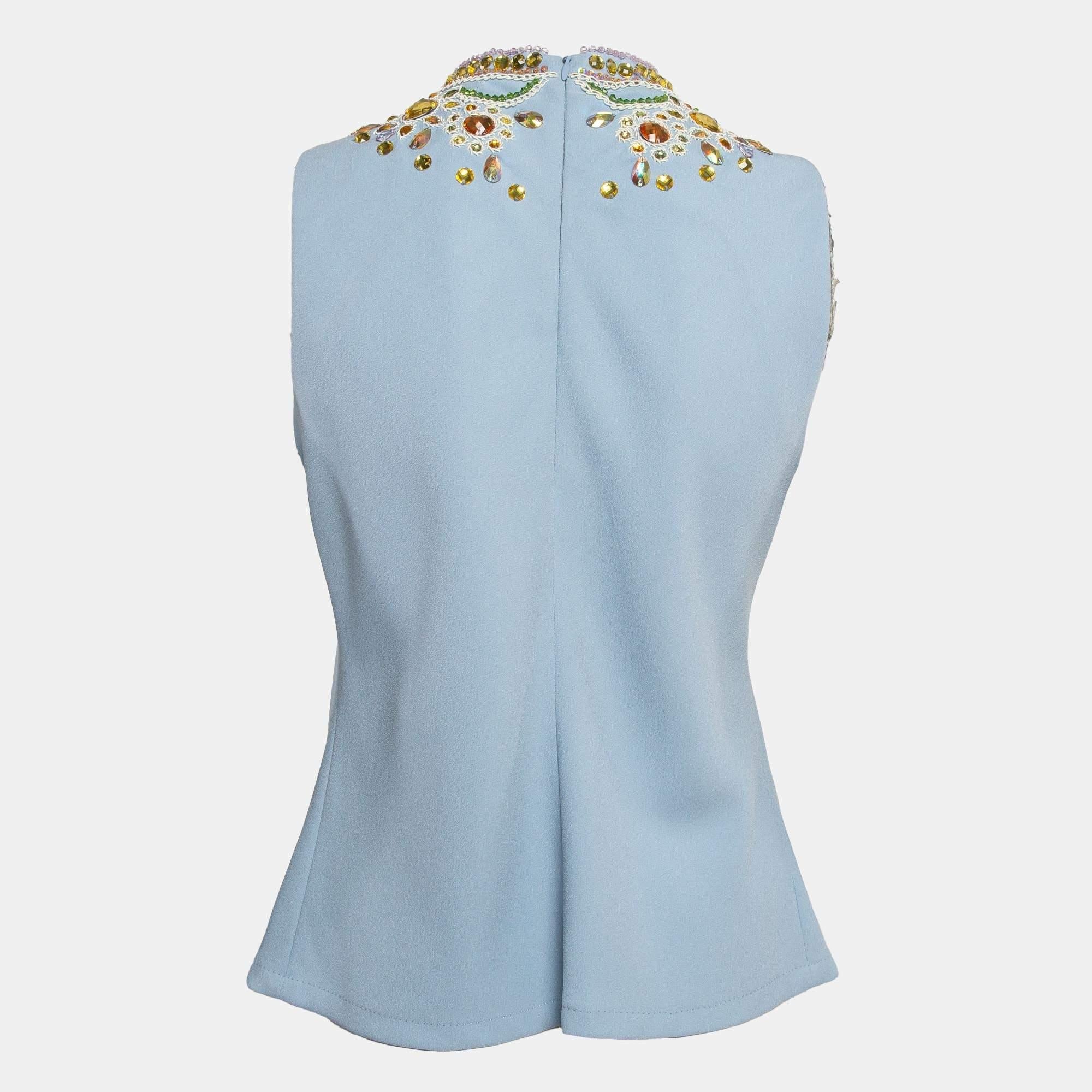 Dieses Designertop bietet Stil und Komfort. Die Kreation wurde aus den besten Stoffen geschneidert und mit vielen Details versehen. Kombinieren Sie es mit einer Jeans und flachen Schuhen.