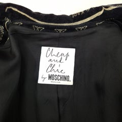 Moschino Cheap and Chic velvet jacket featuring designs inspired by 90s fashion history