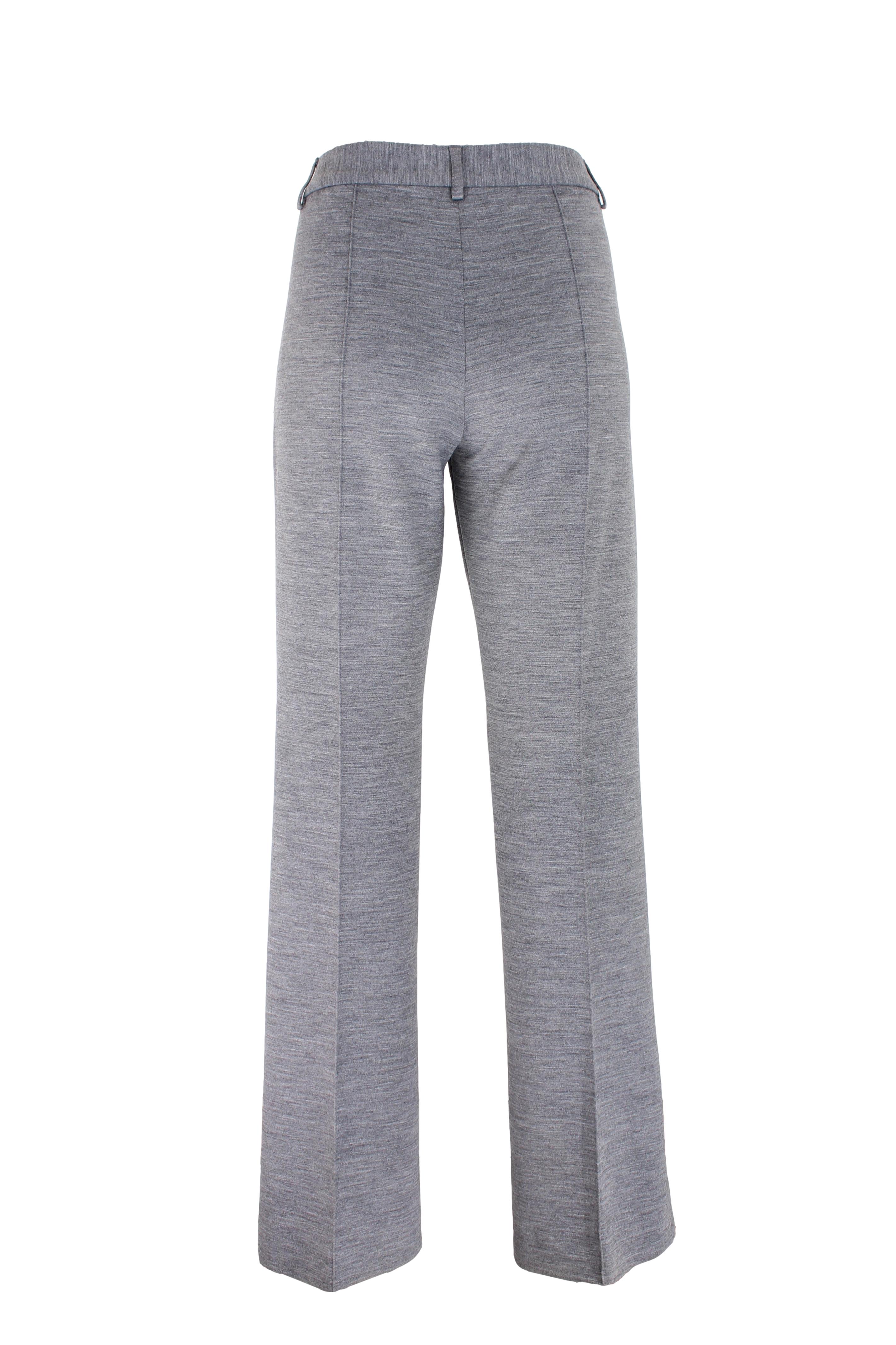 Moschino Cheap and Chic 2000s vintage women's trousers. Palazzo trousers, side pockets, zip and double button closure. Gray color, 52% polyester, 43% virgin wool fabric. Made in Italy.

Condition: Excellent

Item used few times, it remains in its