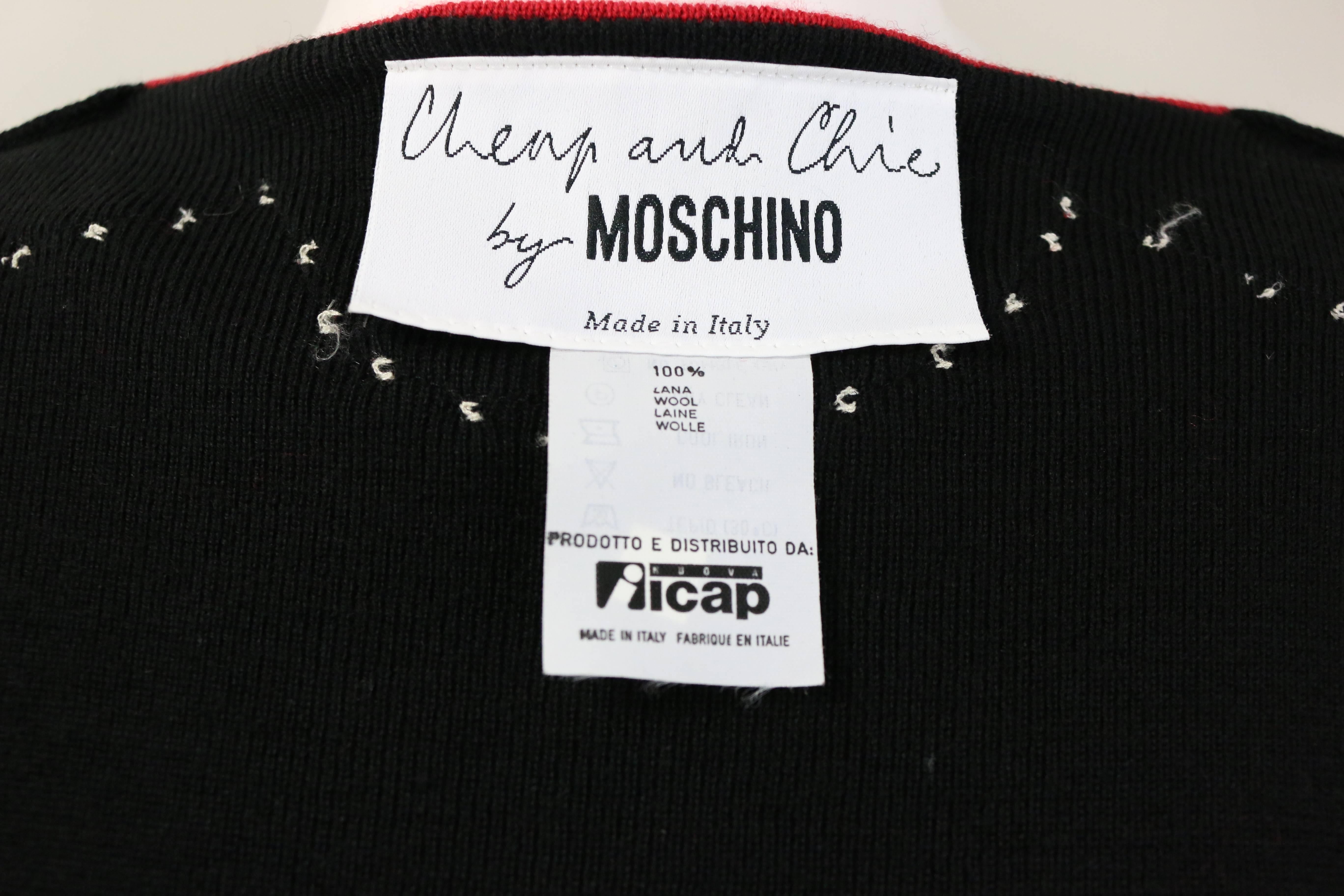 Black Moschino cheap and chic heart surrounded by mother of pearl buttons top