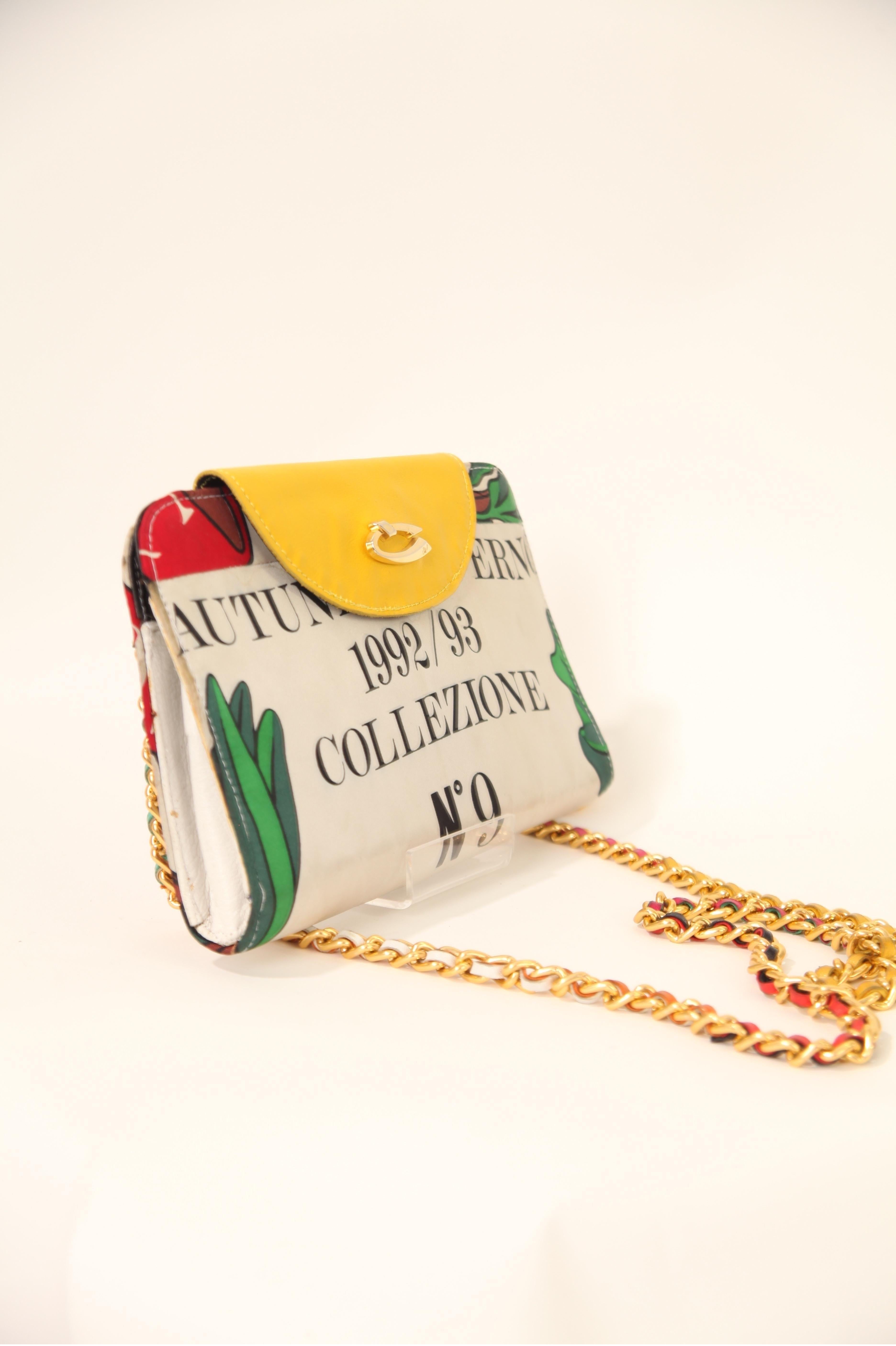 


The 1992 Moschino clutch bag, a standout from the 92/93 autumn/inverno collezione, pays homage to the genius of early Moschino pieces. Crafted by Franco Moschino, the 