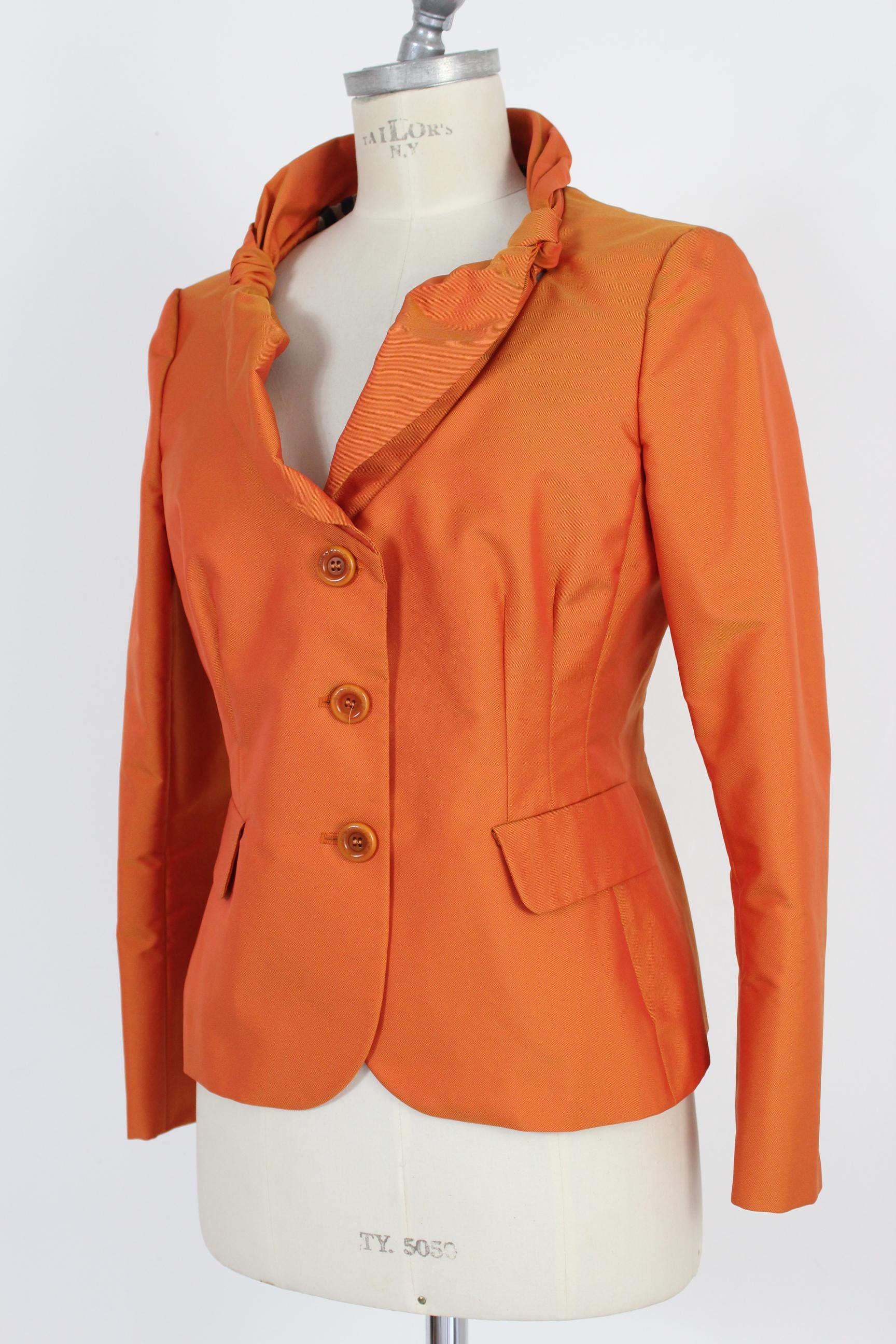 orange fitted jacket