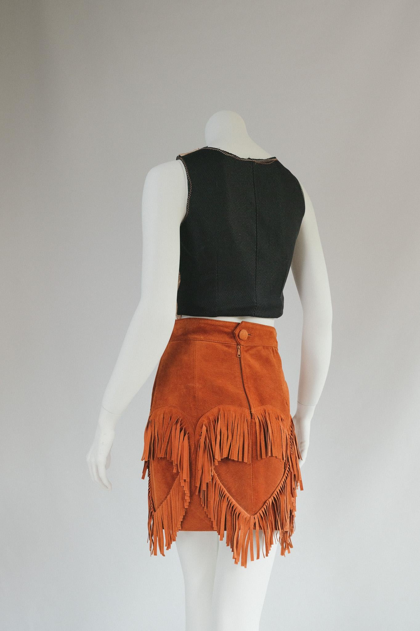 orange tassel skirt